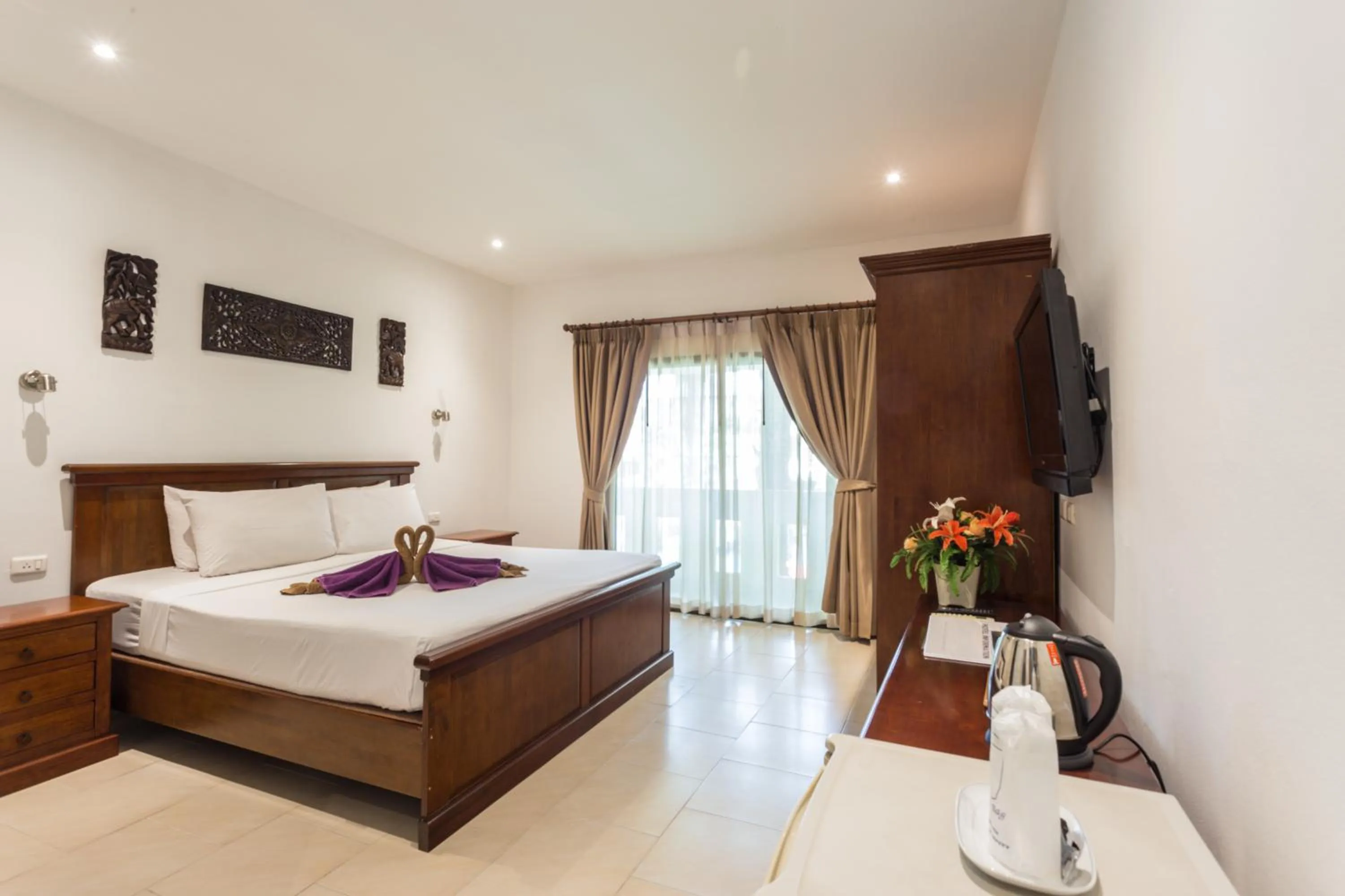 Photo of the whole room, Bed in Austrian Garden Hotel & Restaurant Patong