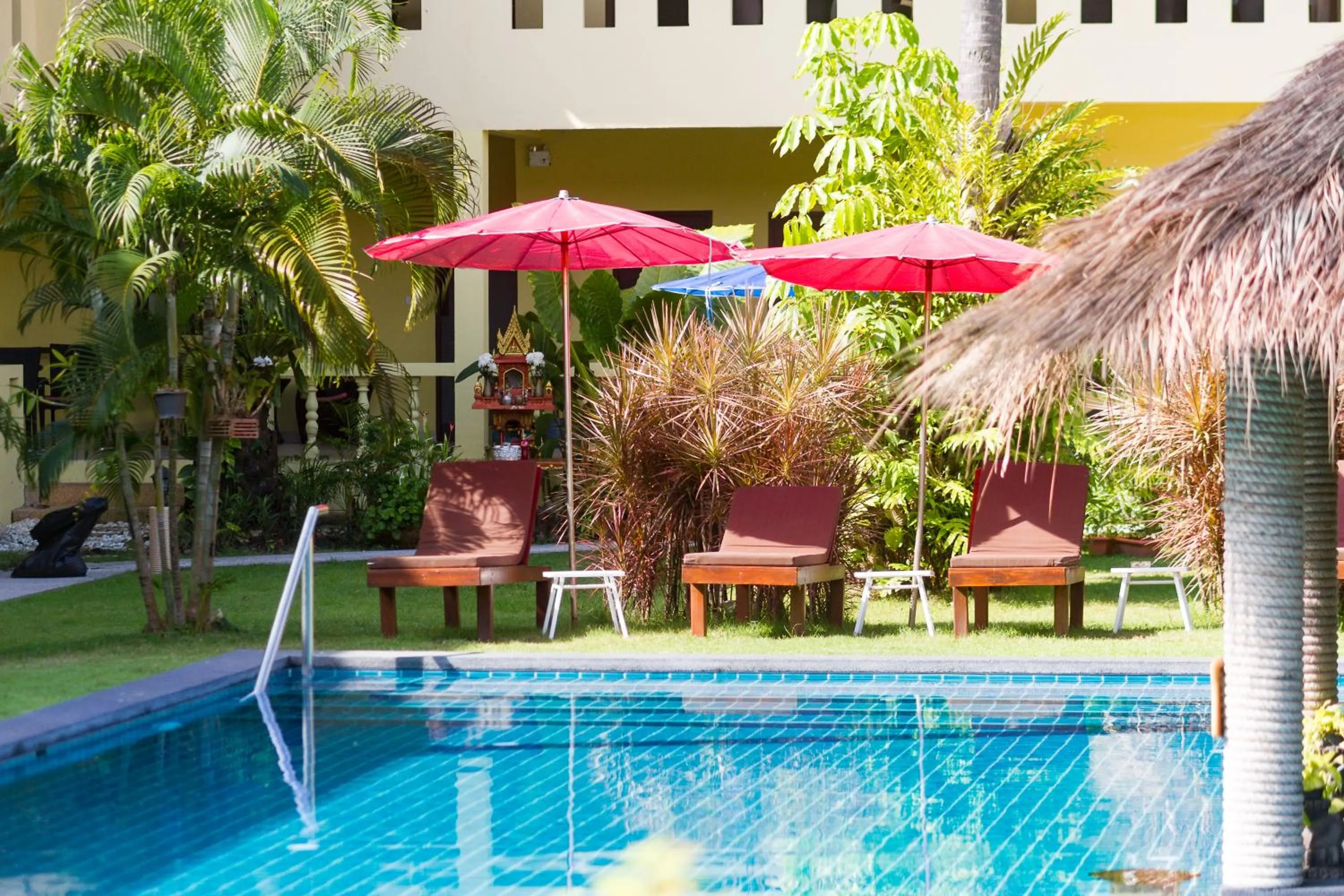 Swimming pool in Austrian Garden Hotel & Restaurant Patong