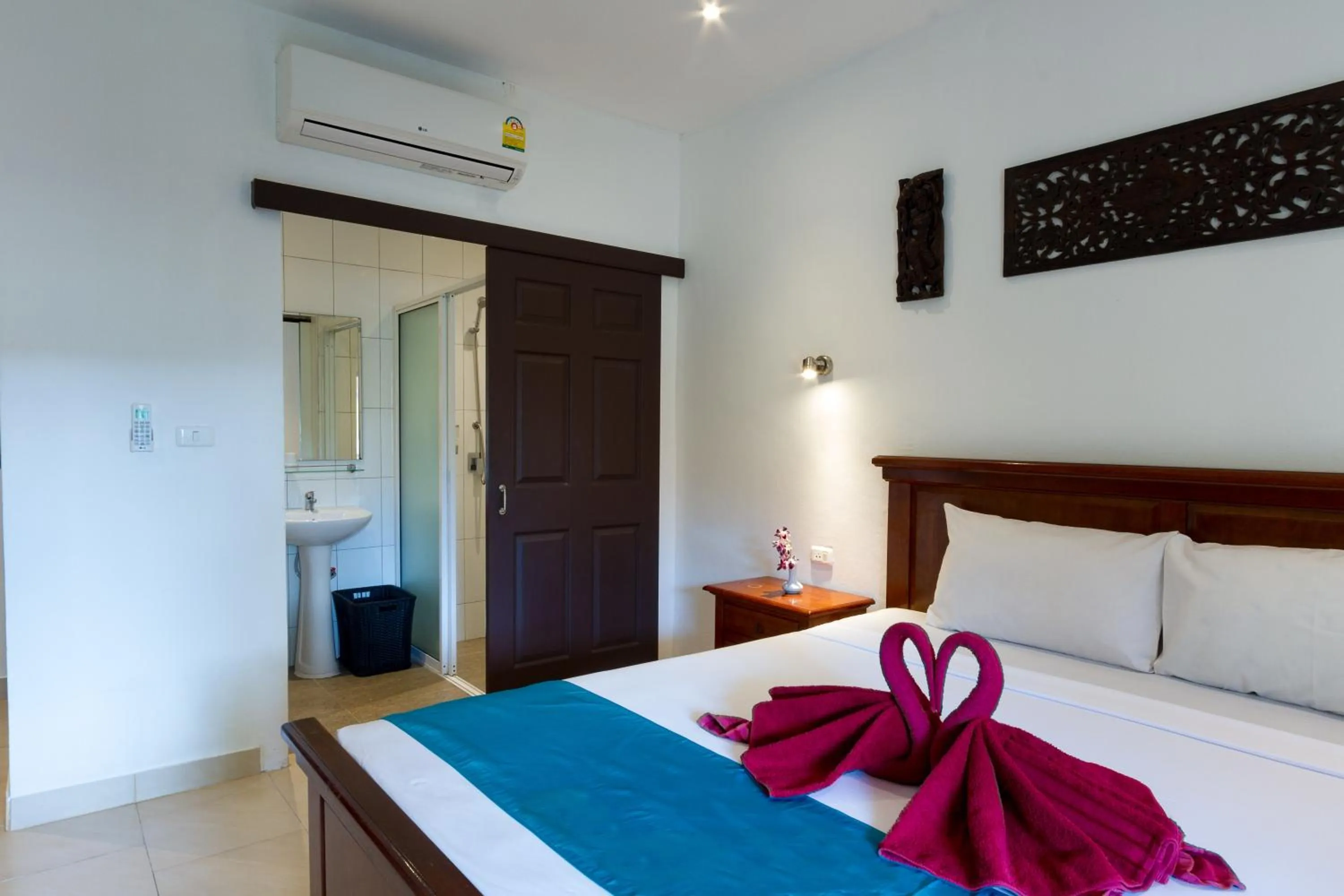 Photo of the whole room, Bed in Austrian Garden Hotel & Restaurant Patong