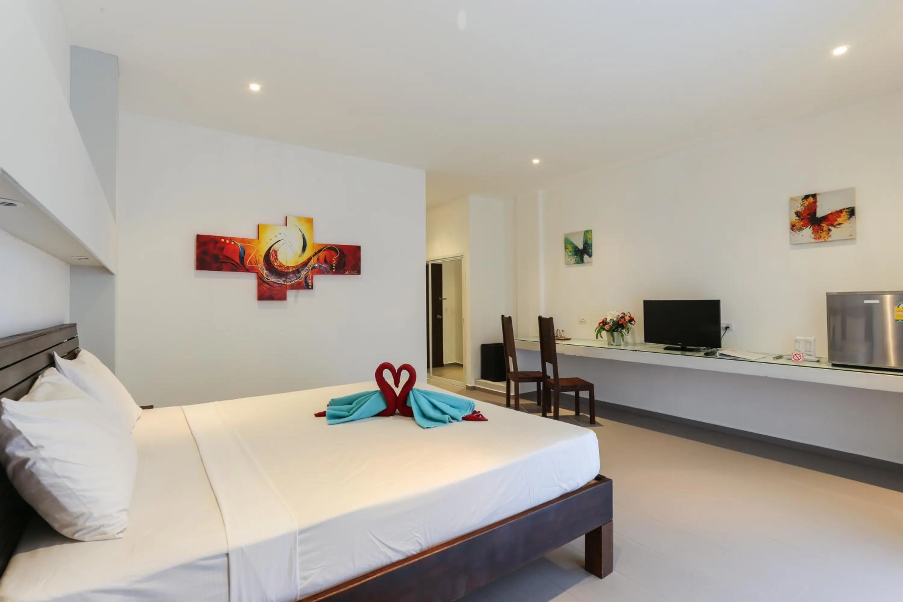 Photo of the whole room, Bed in Austrian Garden Hotel & Restaurant Patong