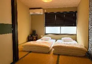 Bed in Kyoto Miyabi Inn