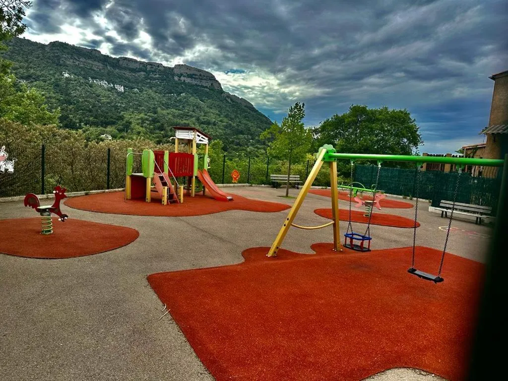 Children play ground in Logis Hotel Restaurant Le Grand Puech