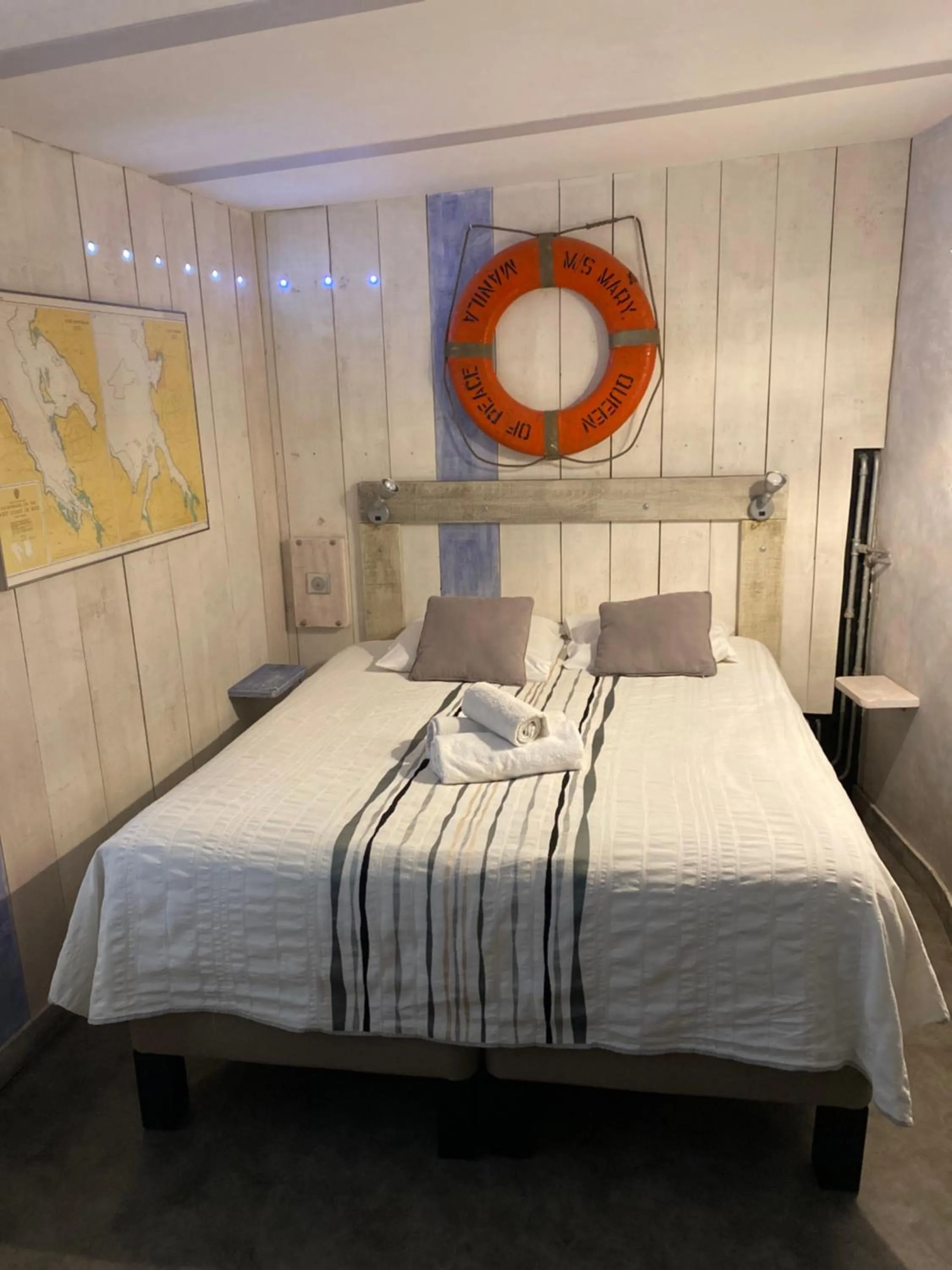 Bed in Logis Hotel Restaurant Le Grand Puech