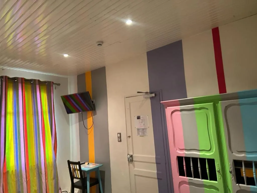 Bed in Logis Hotel Restaurant Le Grand Puech