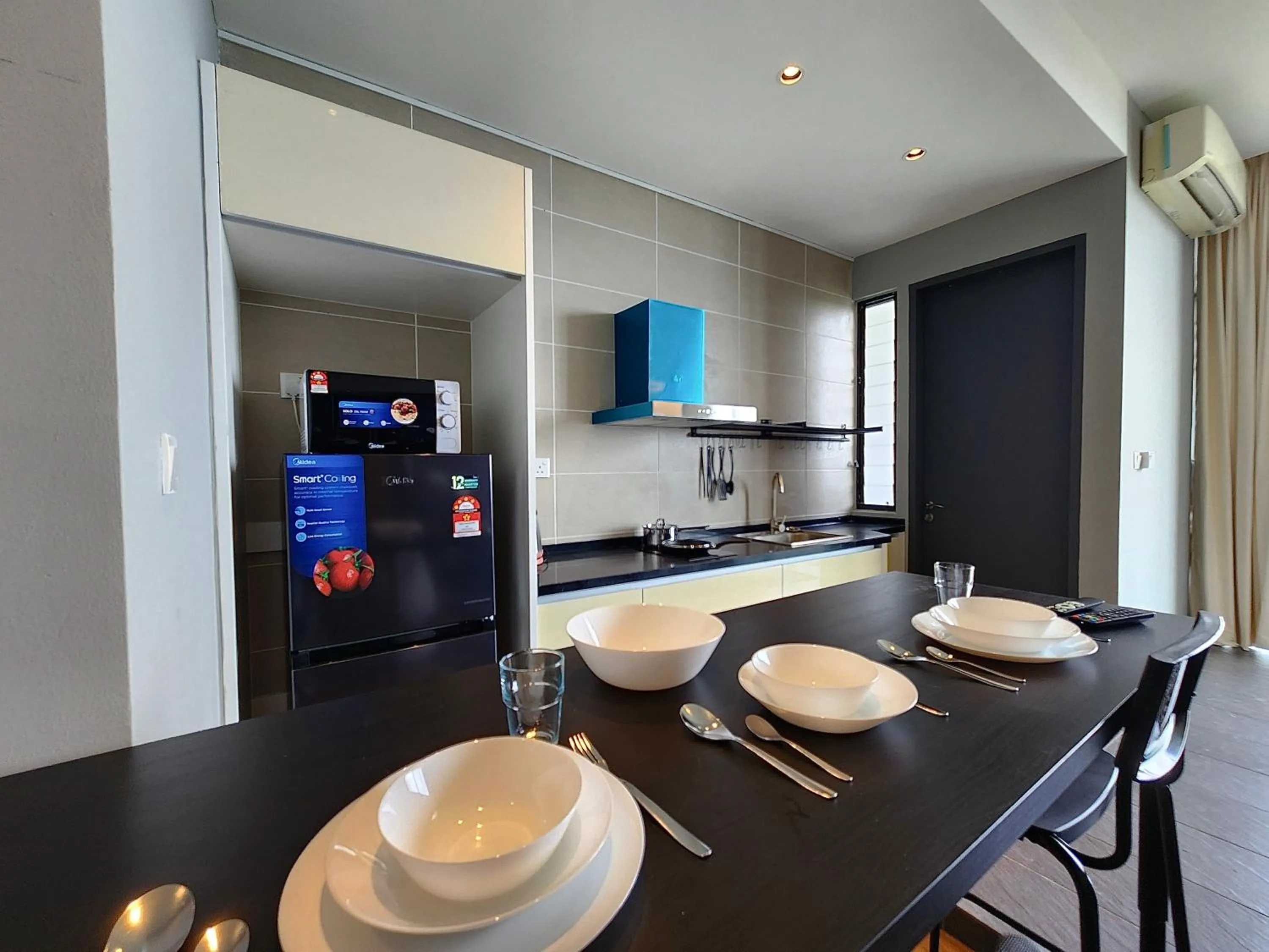Dining area in D'Pristine Suites by RR JBcity