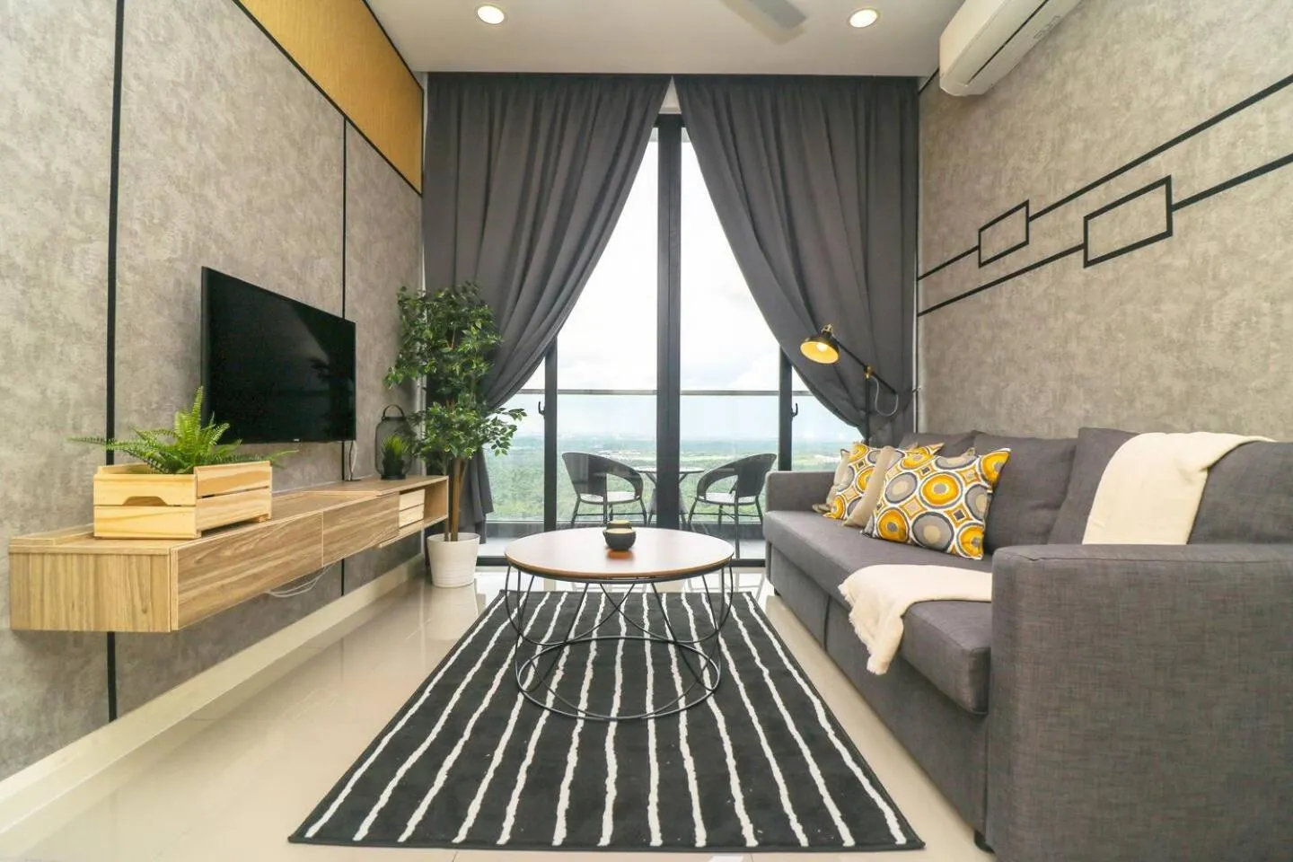 TV and multimedia in D'Pristine Suites by RR JBcity
