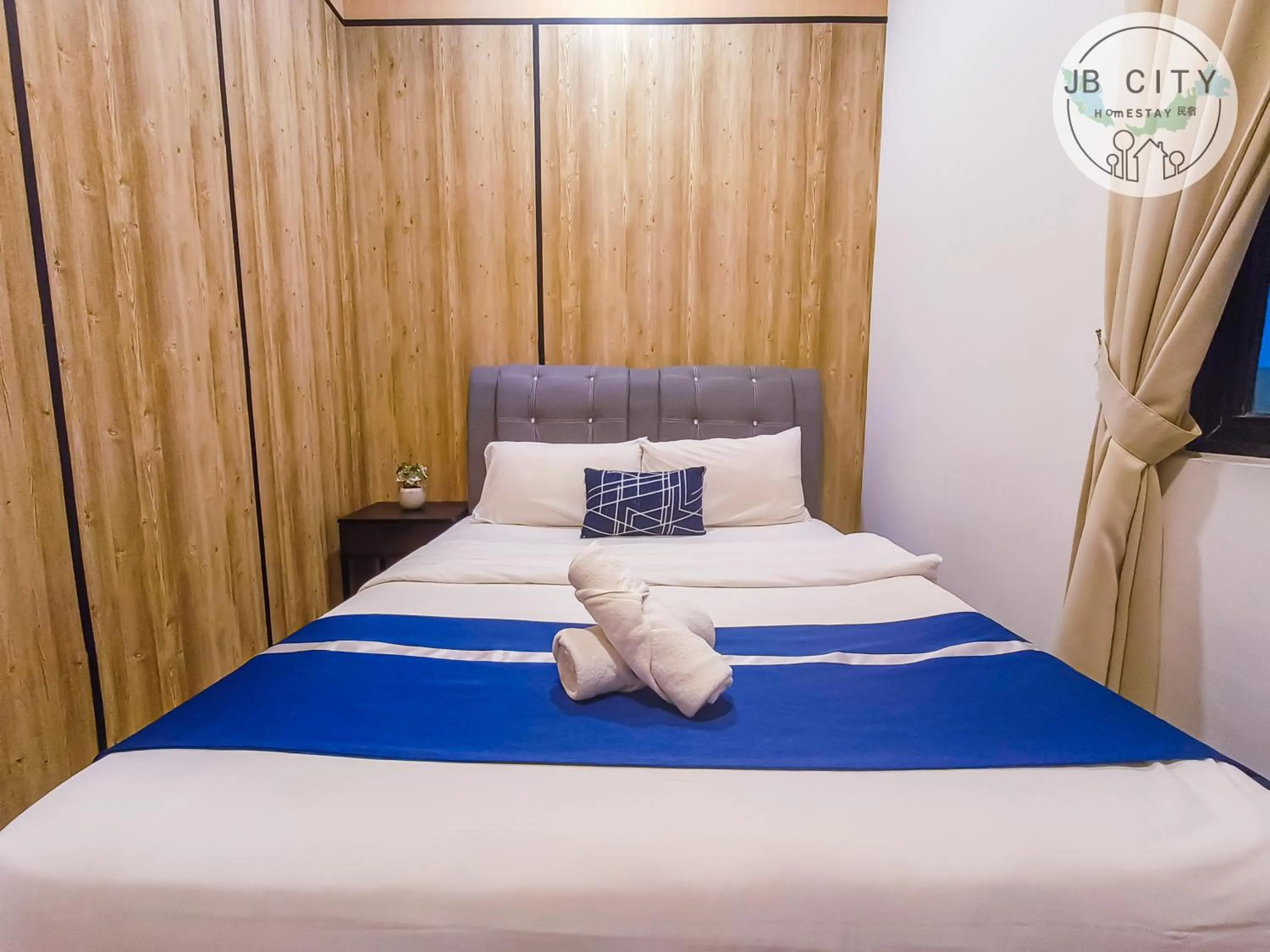 Bed in D'Pristine Suites by RR JBcity