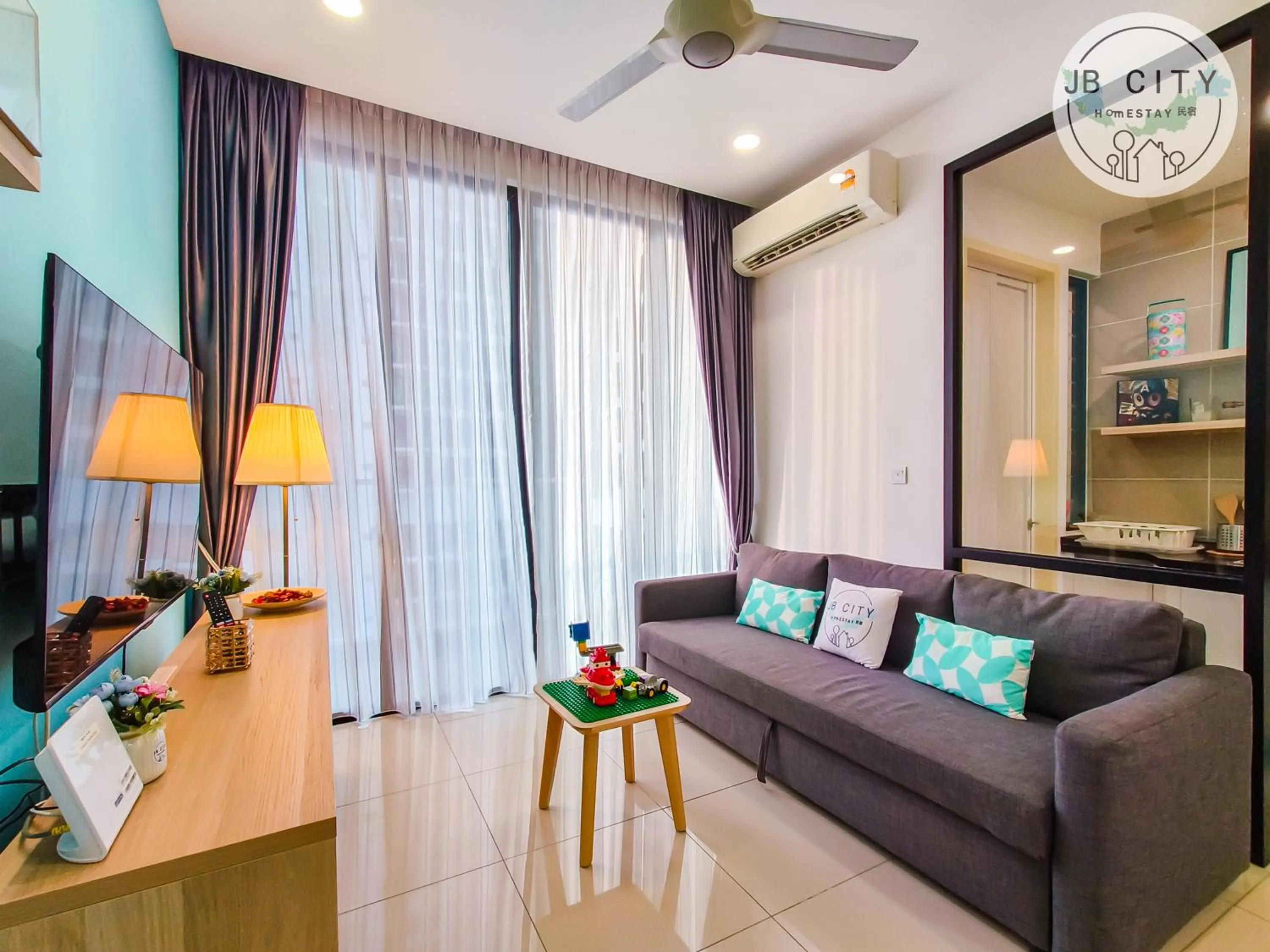 TV and multimedia in D'Pristine Suites by RR JBcity