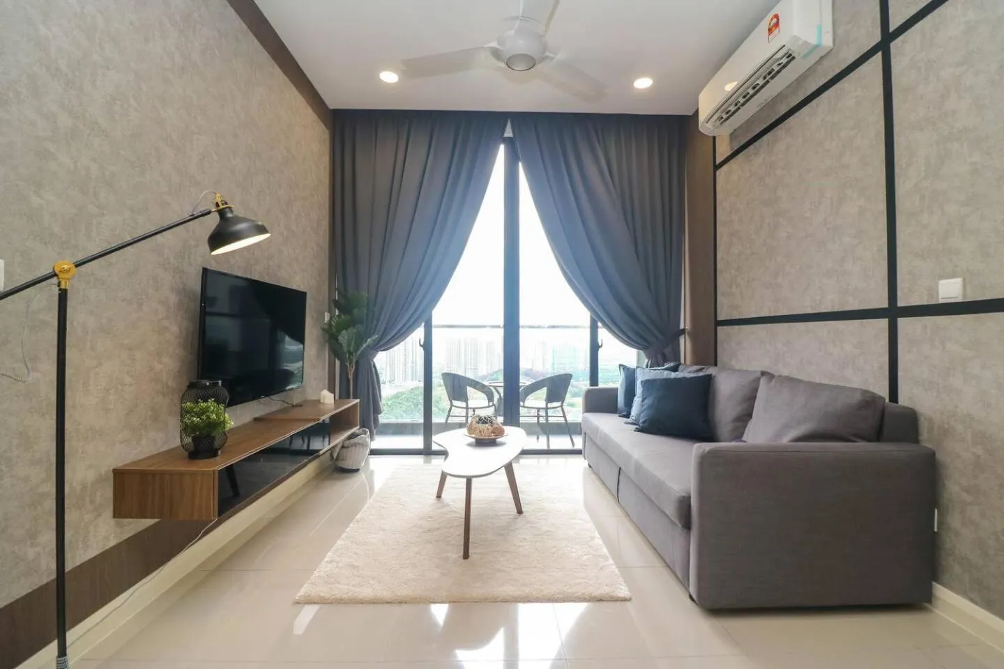 TV and multimedia in D'Pristine Suites by RR JBcity