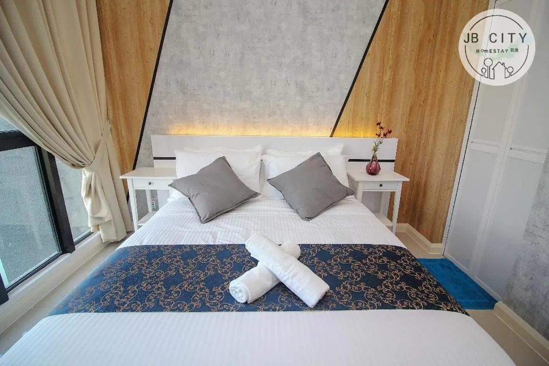 Bed in D'Pristine Suites by RR JBcity