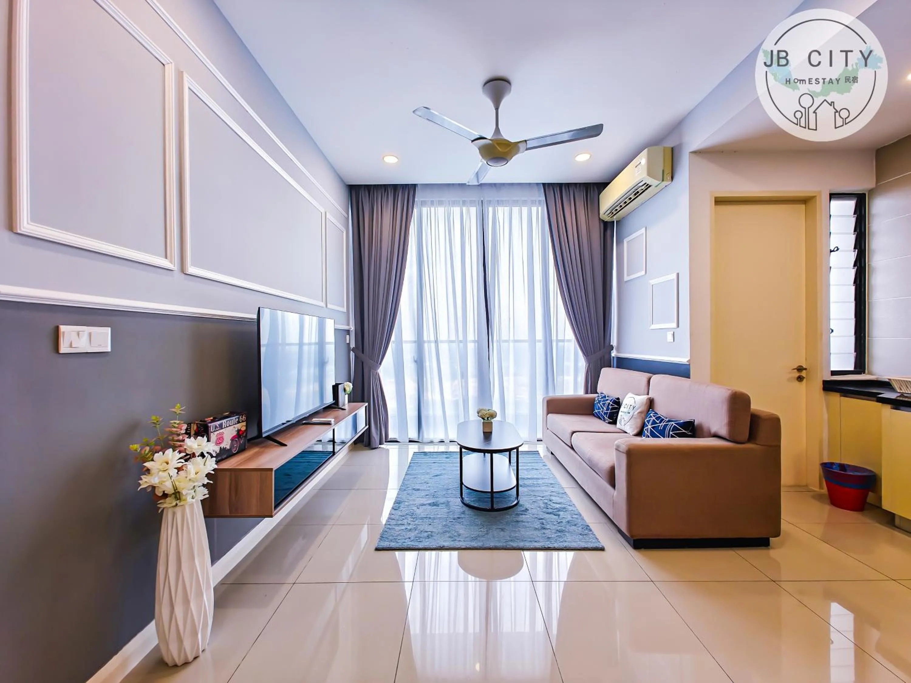 TV and multimedia in D'Pristine Suites by RR JBcity