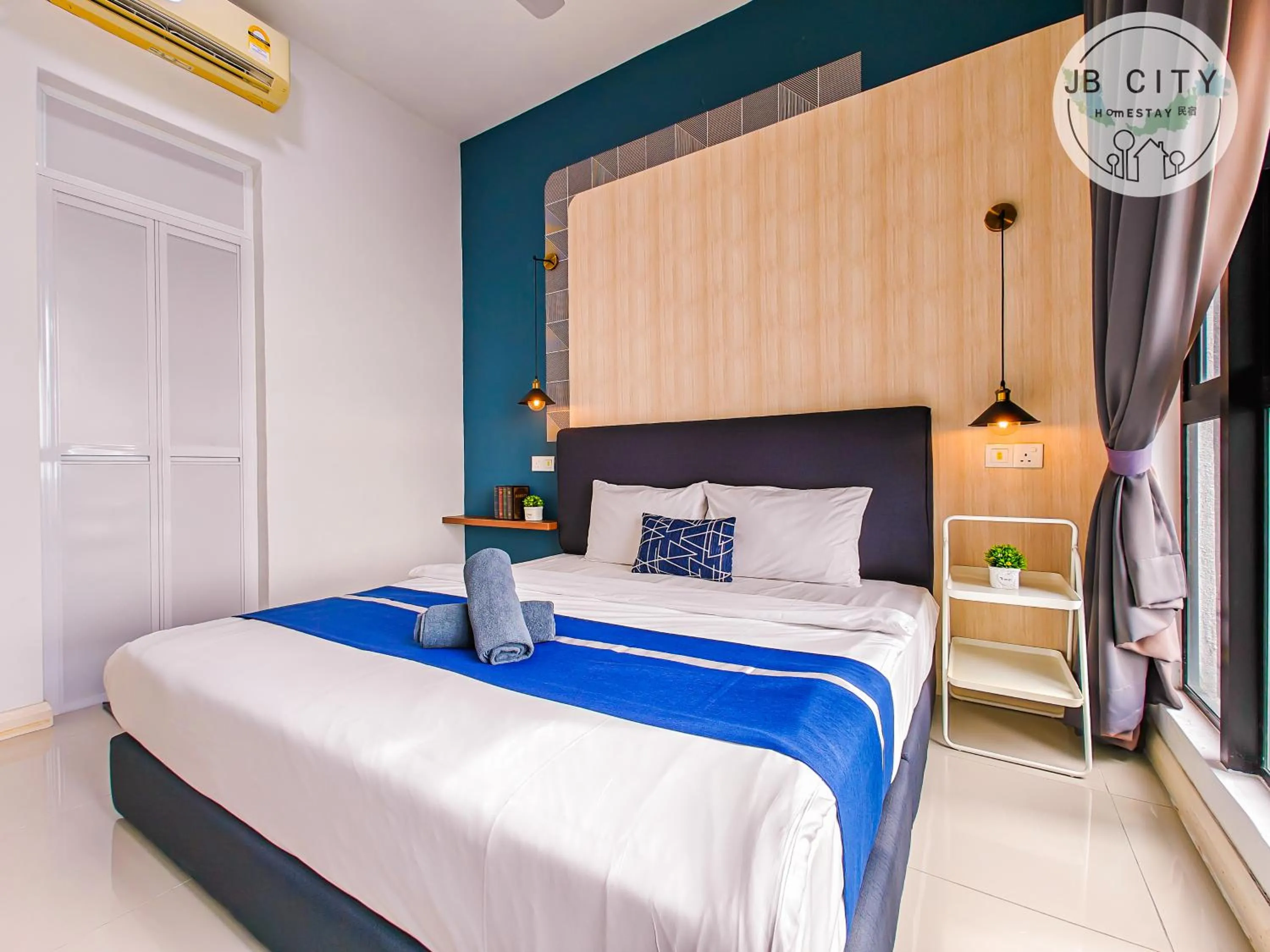 Bed in D'Pristine Suites by RR JBcity