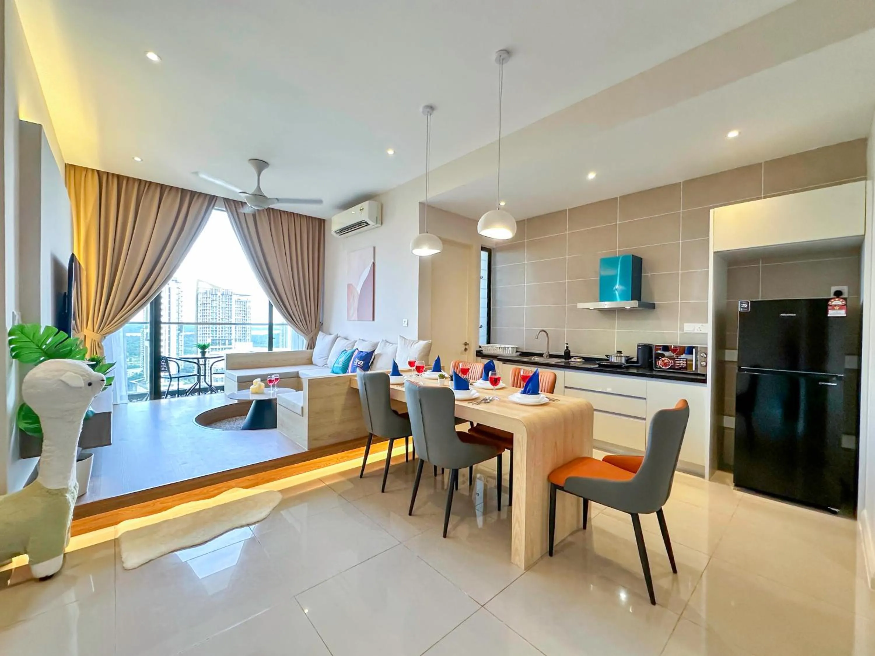 Living room in D'Pristine Suites by RR JBcity