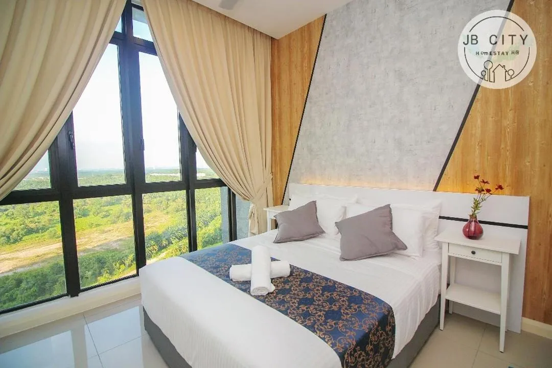 Bed in D'Pristine Suites by RR JBcity