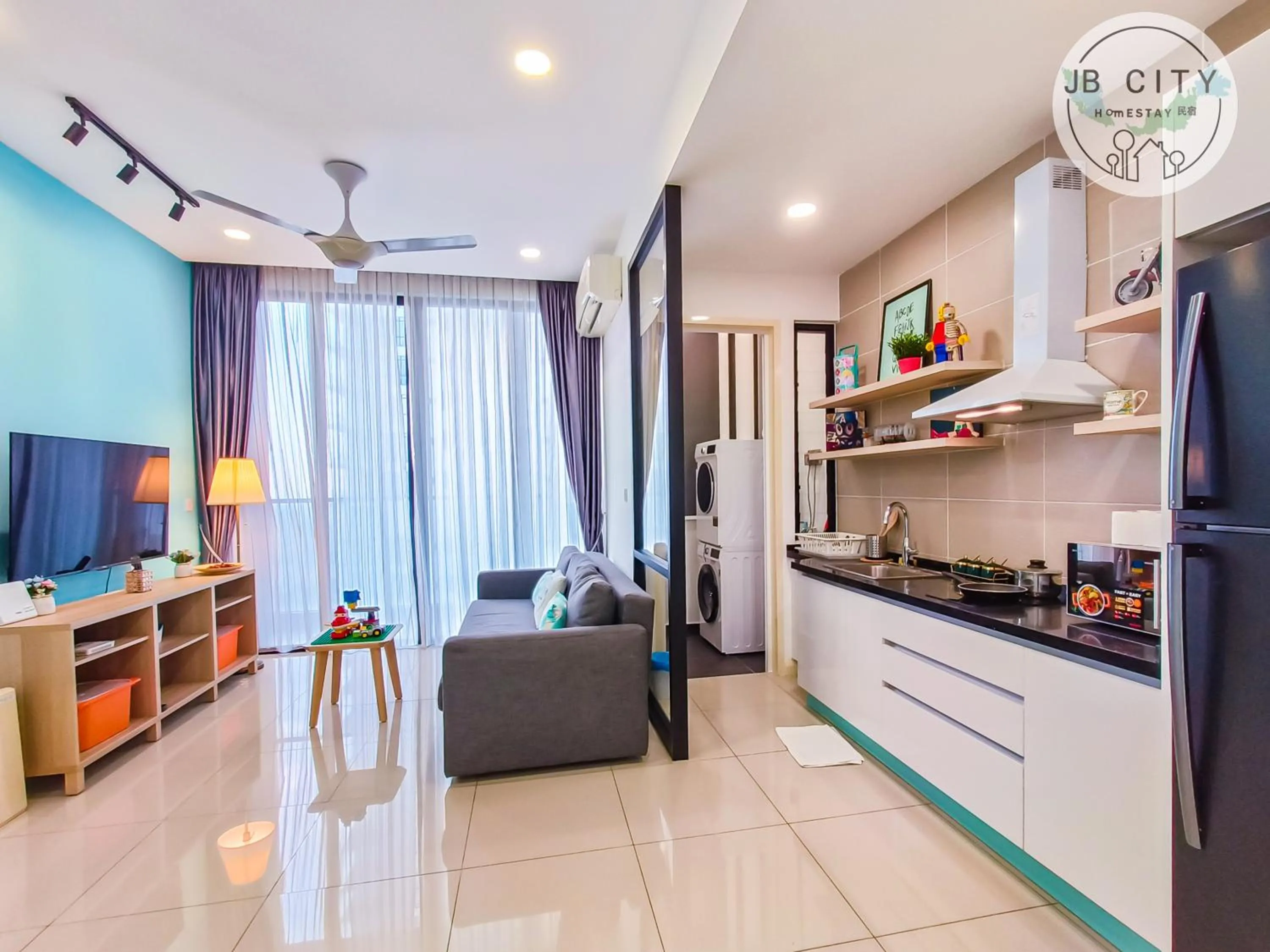 Living room in D'Pristine Suites by RR JBcity