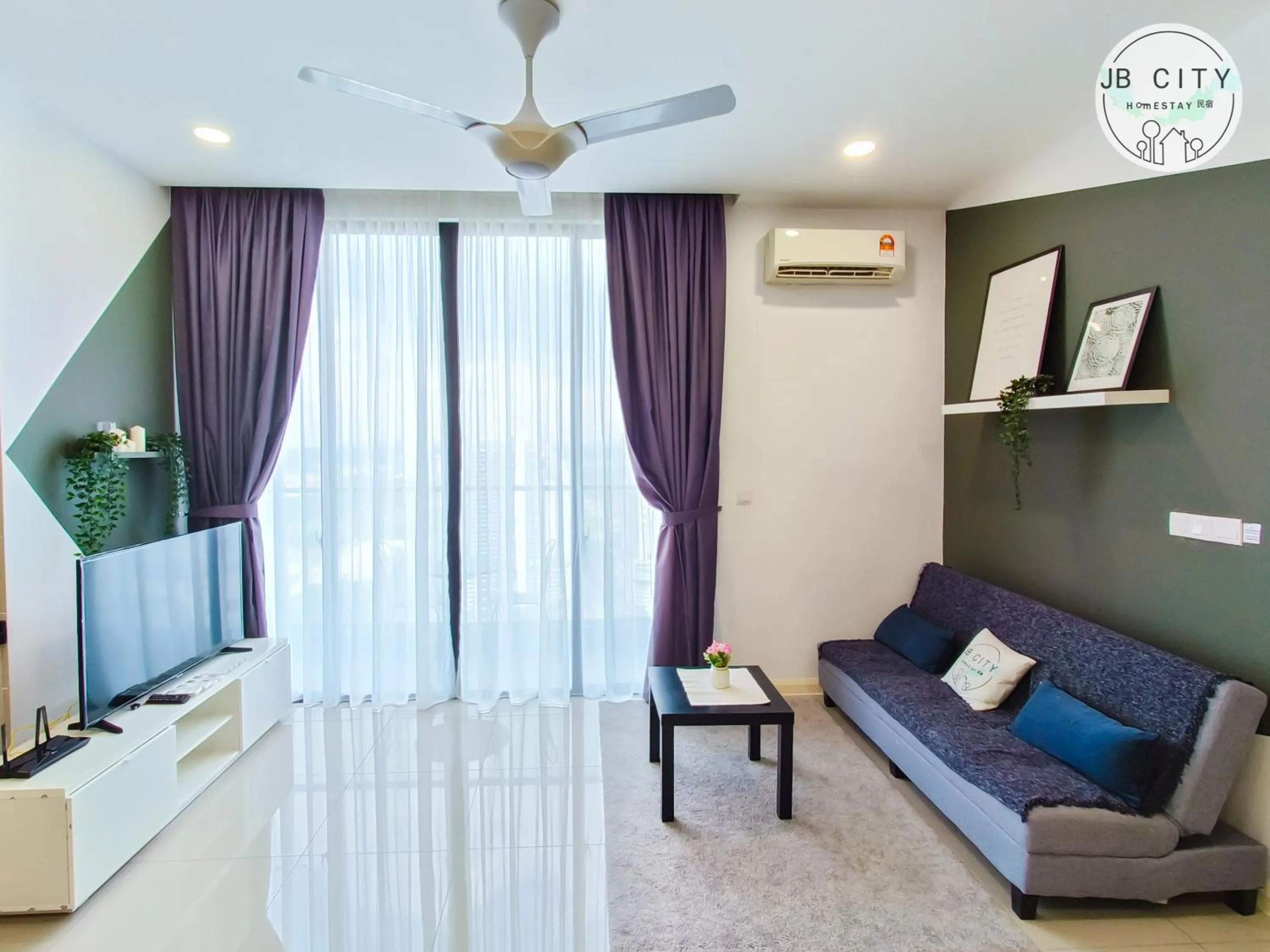 Living room in D'Pristine Suites by RR JBcity