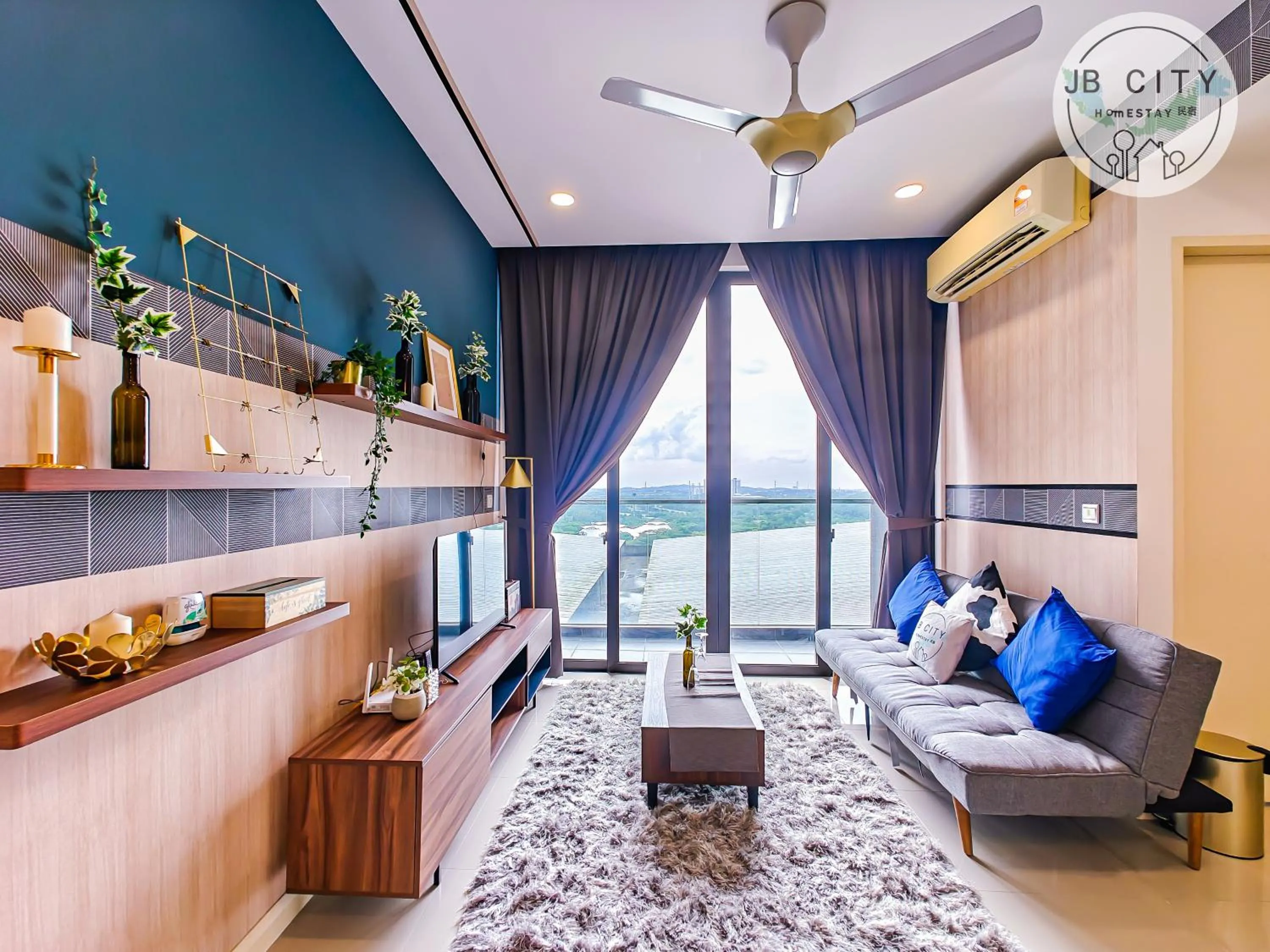 TV and multimedia in D'Pristine Suites by RR JBcity
