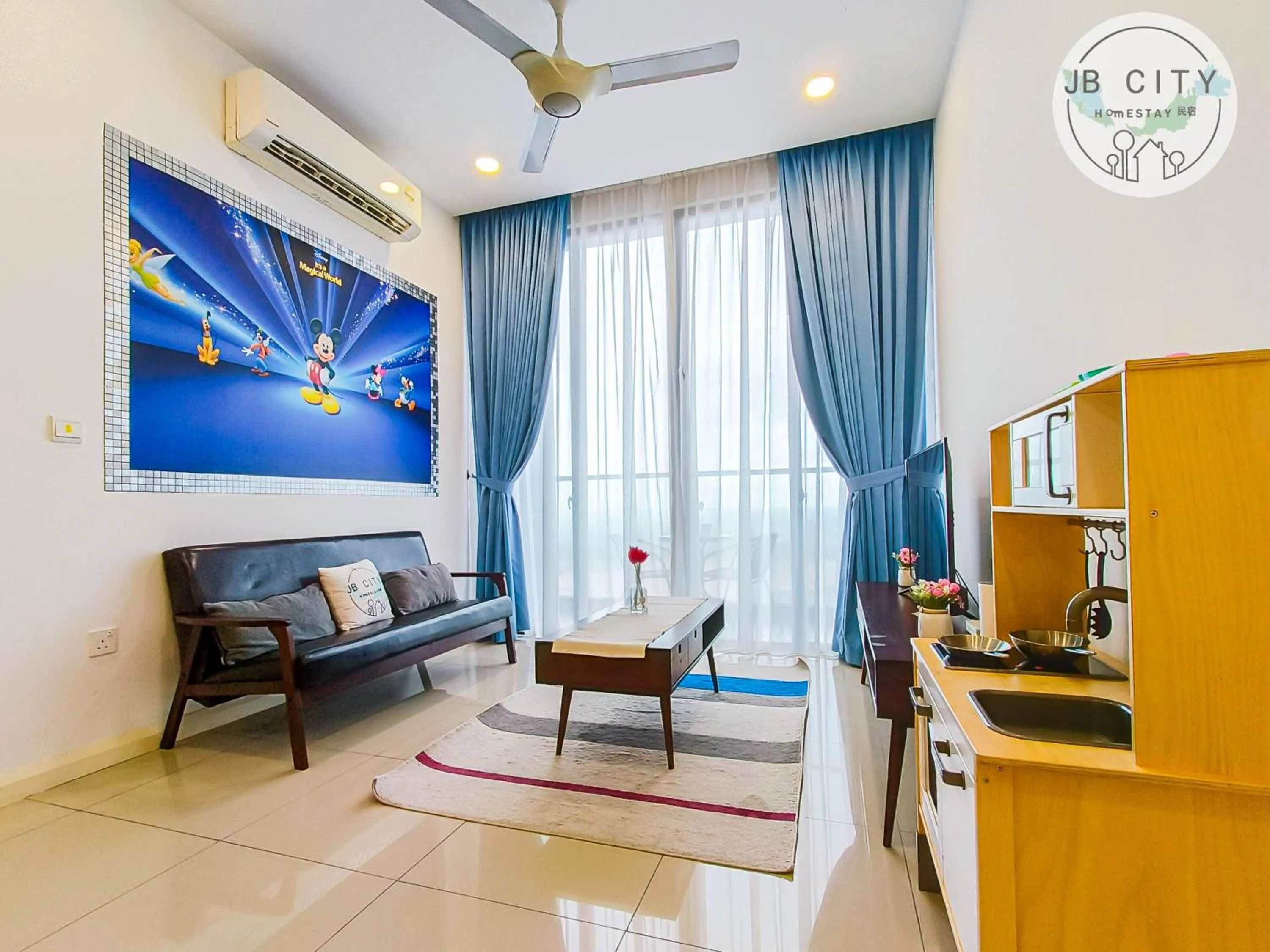 Living room in D'Pristine Suites by RR JBcity
