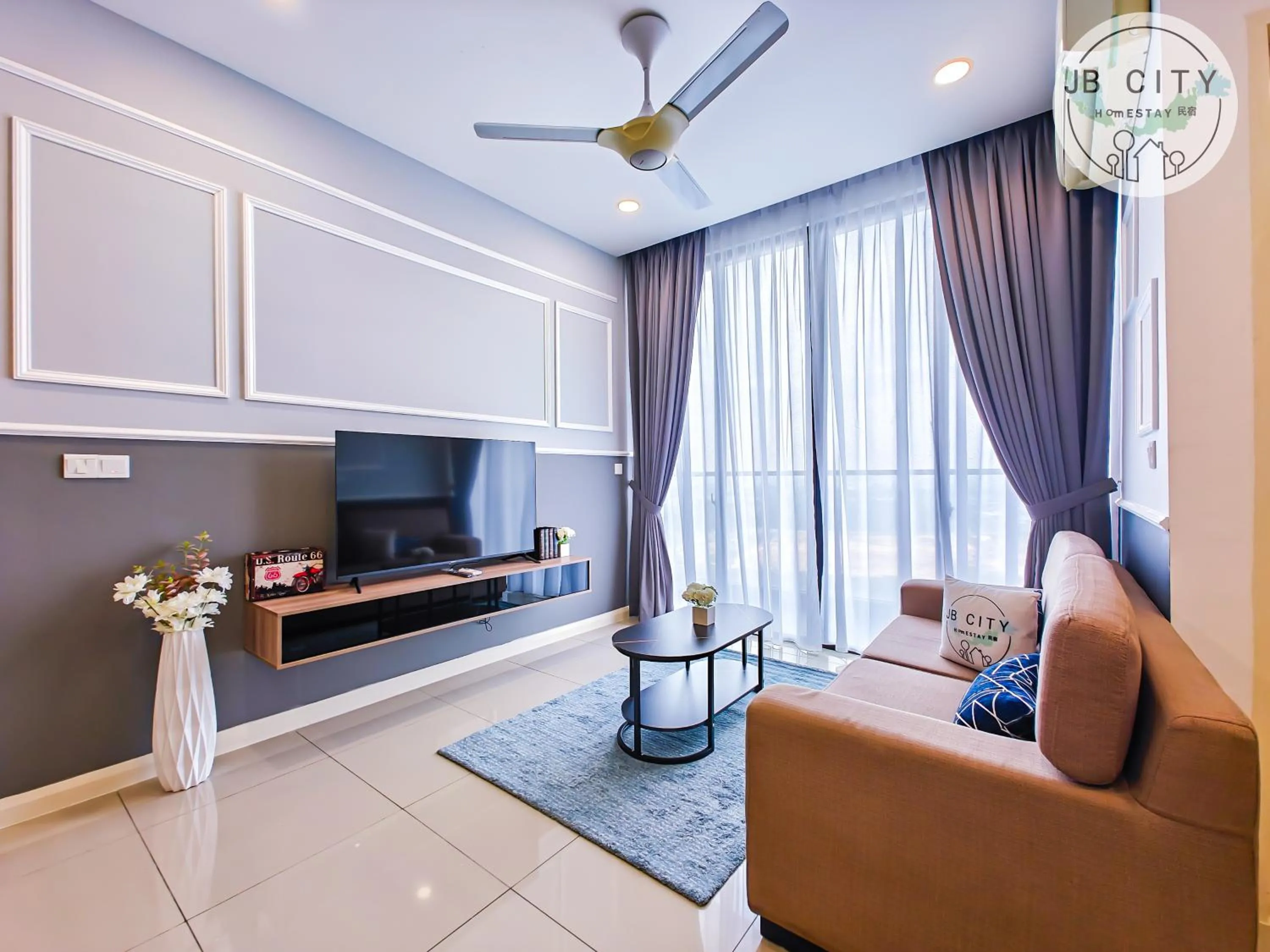 TV and multimedia in D'Pristine Suites by RR JBcity