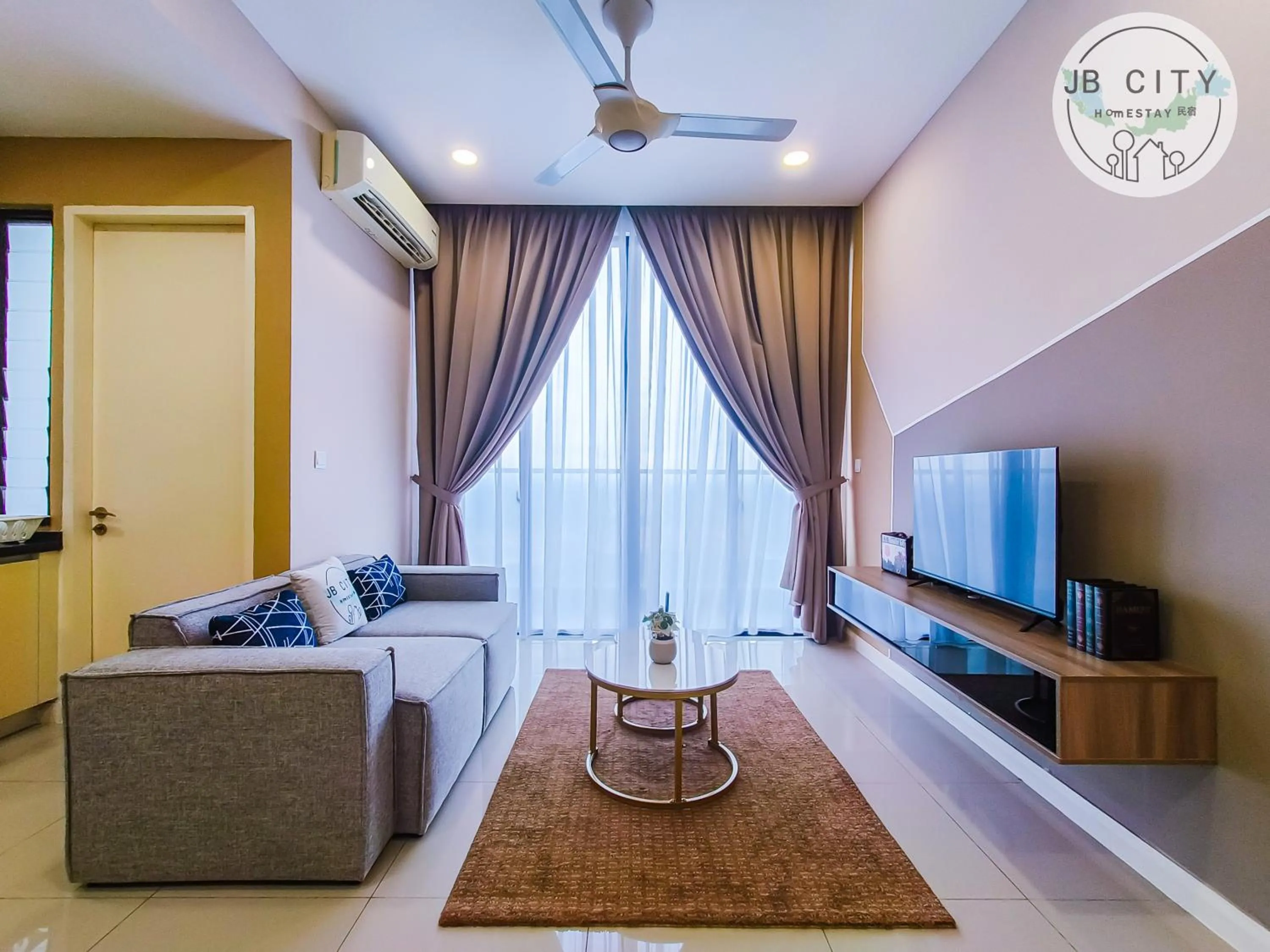 TV and multimedia in D'Pristine Suites by RR JBcity