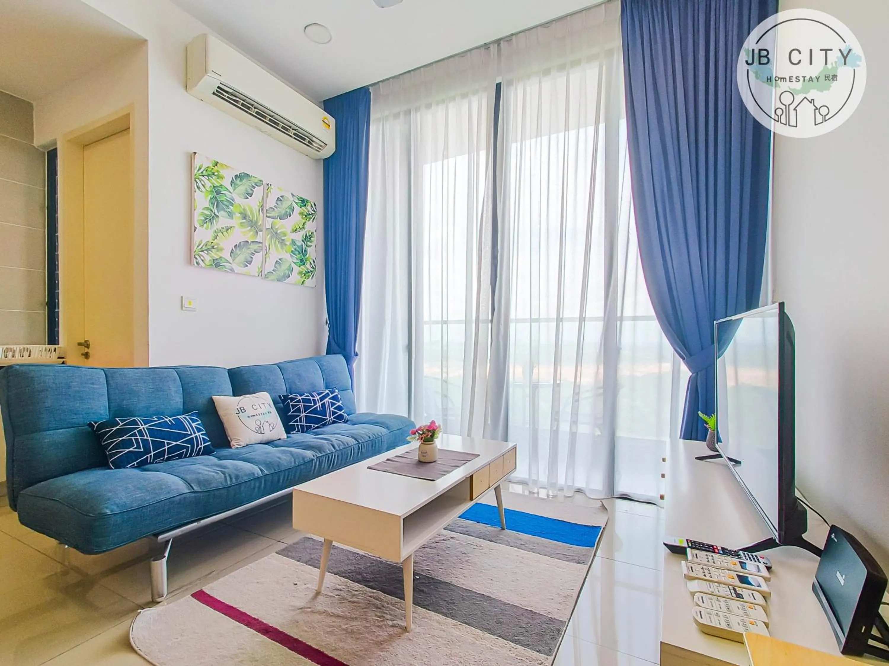 TV and multimedia in D'Pristine Suites by RR JBcity