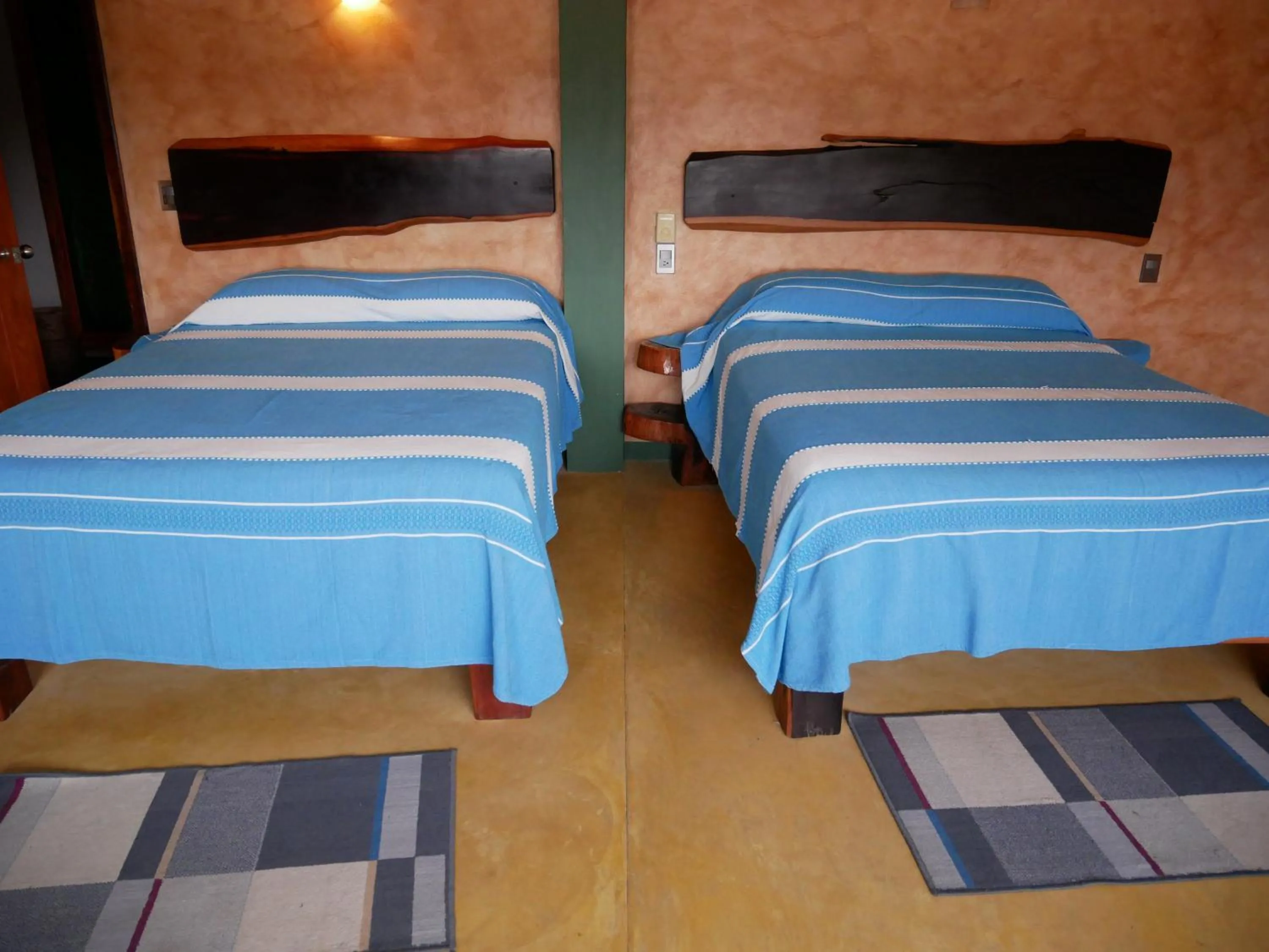 Bed in Madre Tierra Hotel & Coworking