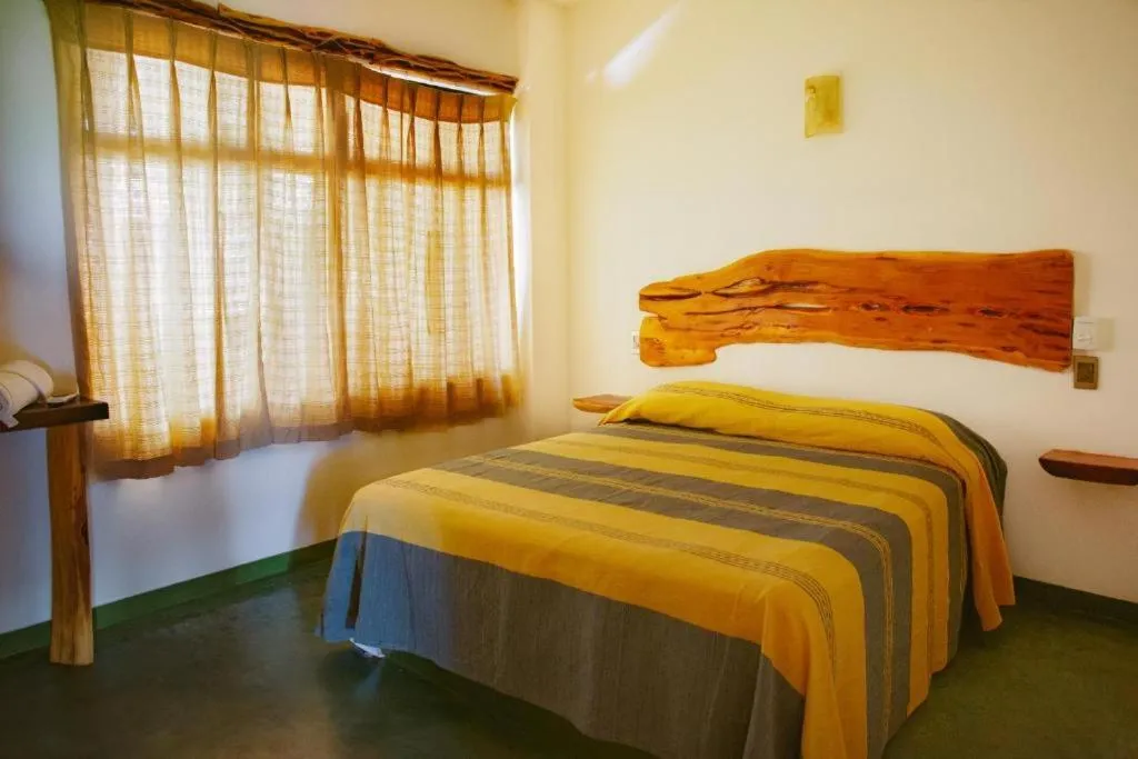 Bed in Madre Tierra Hotel & Coworking