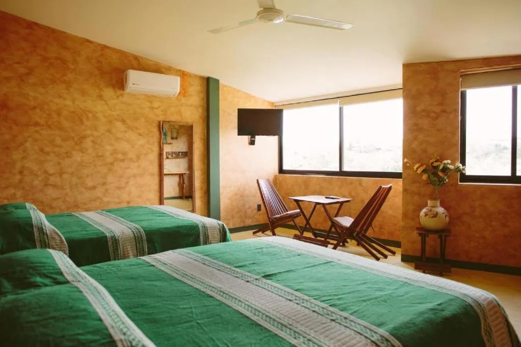 Bed in Madre Tierra Hotel & Coworking
