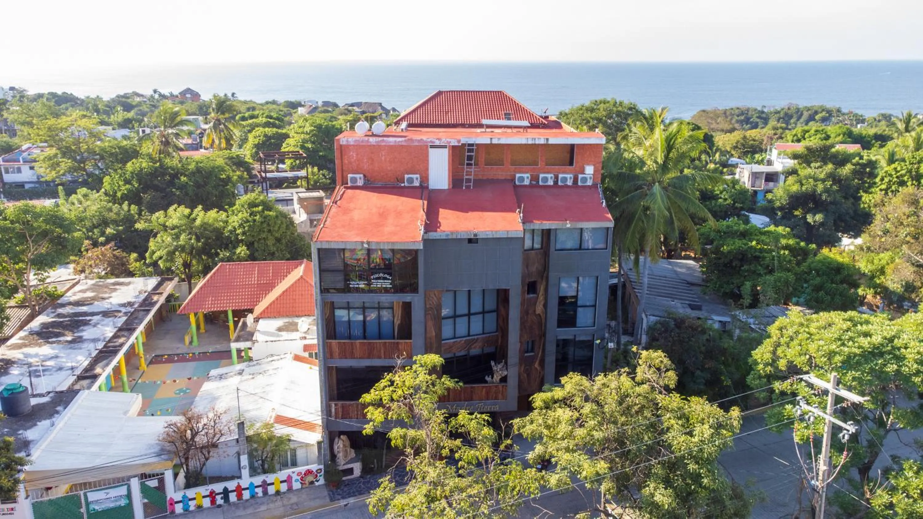 Property building in Madre Tierra Hotel & Coworking