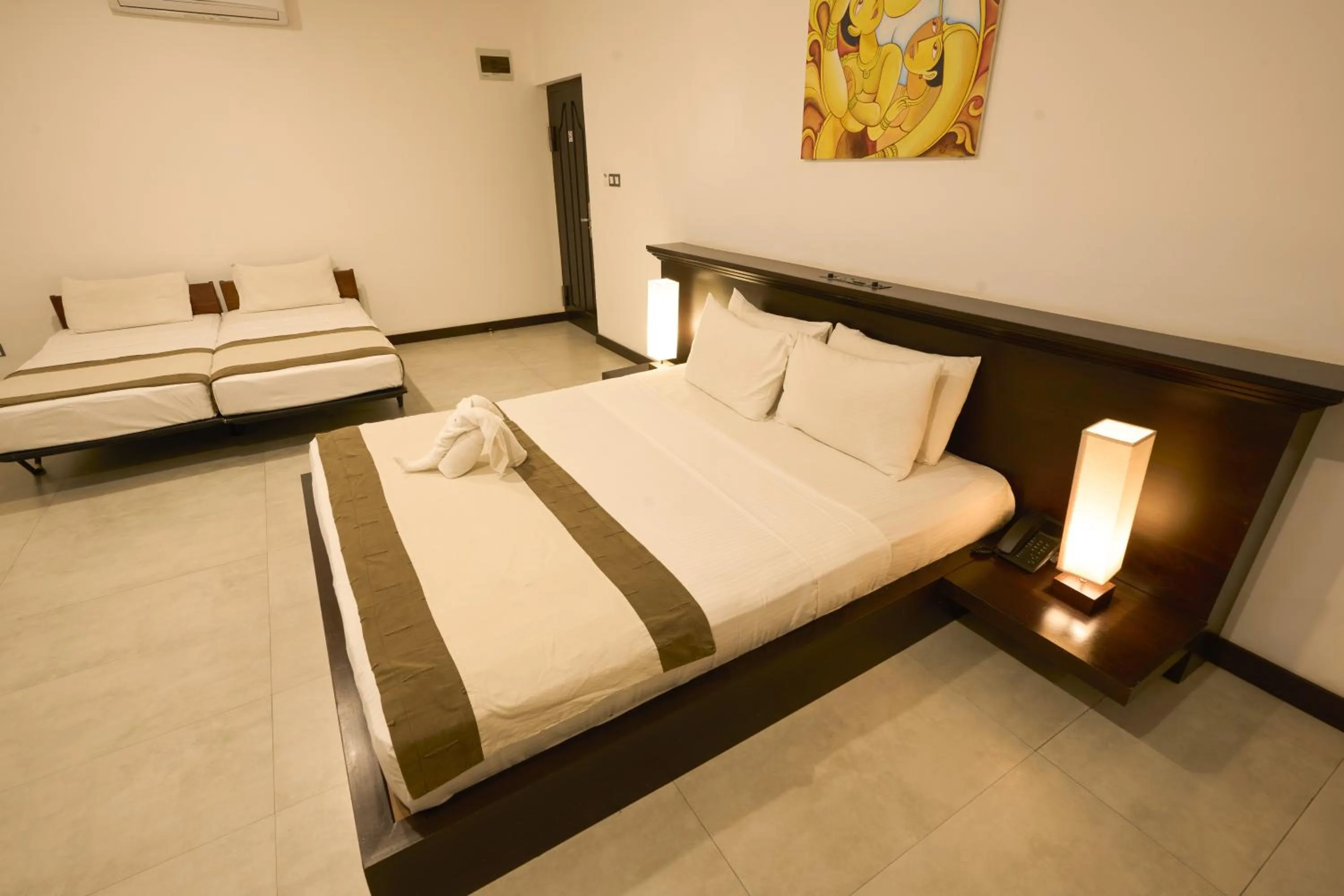 Bed in Rajarata Hotel Anuradhapura