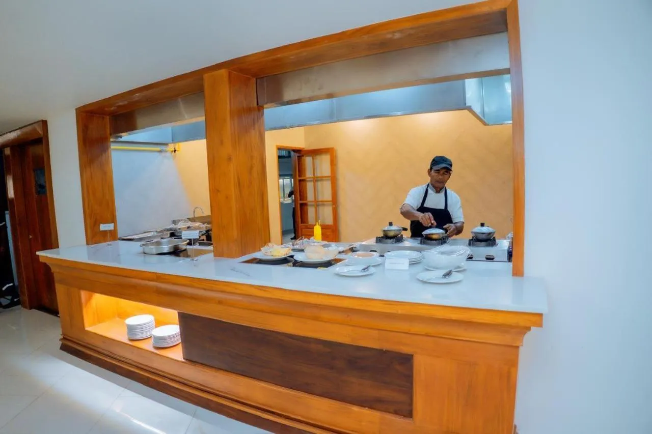 Kitchen or kitchenette in Rajarata Hotel Anuradhapura