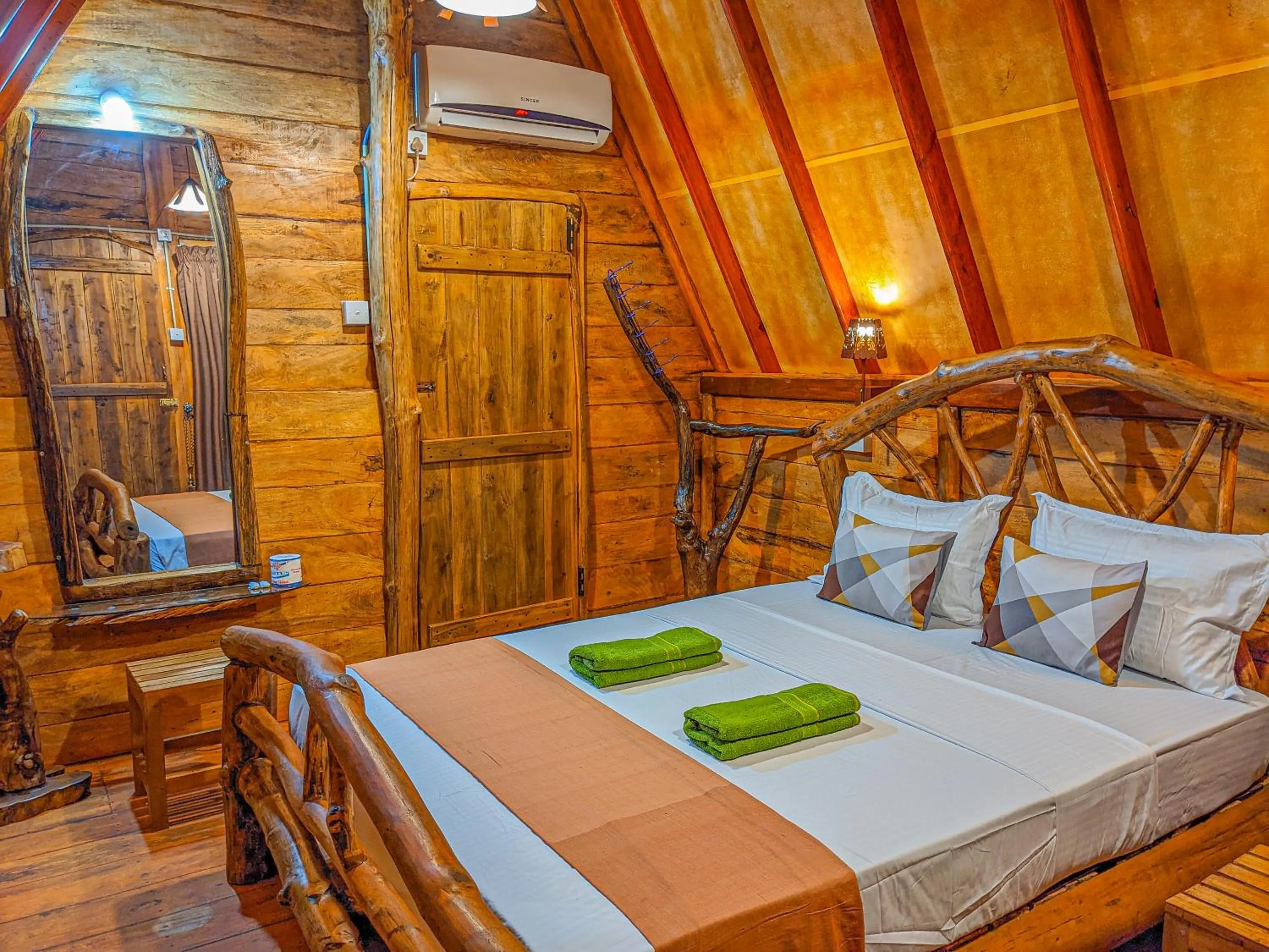 Bed in Sigiri Choona Lodge 'unique sunrise viewpoint'