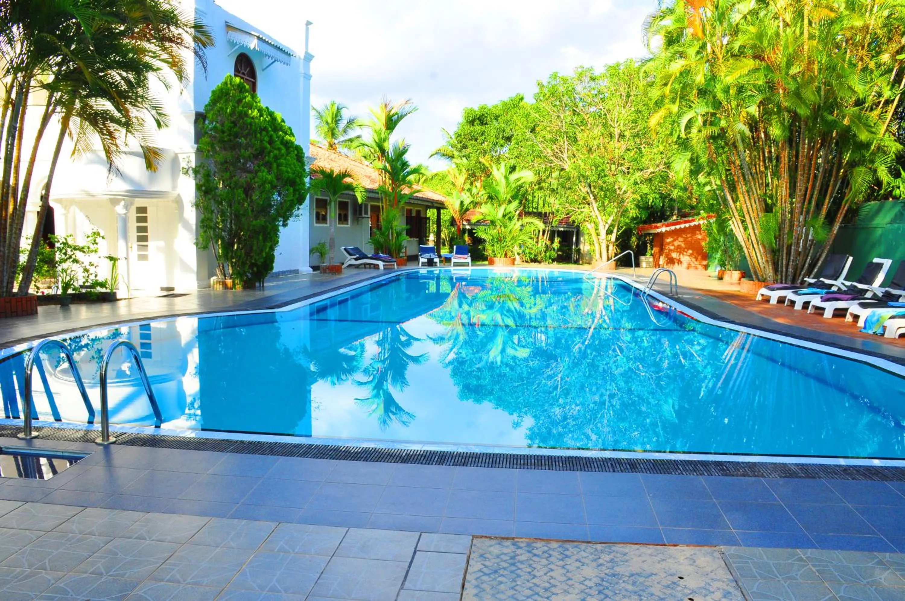 Swimming pool in Bougain Villa