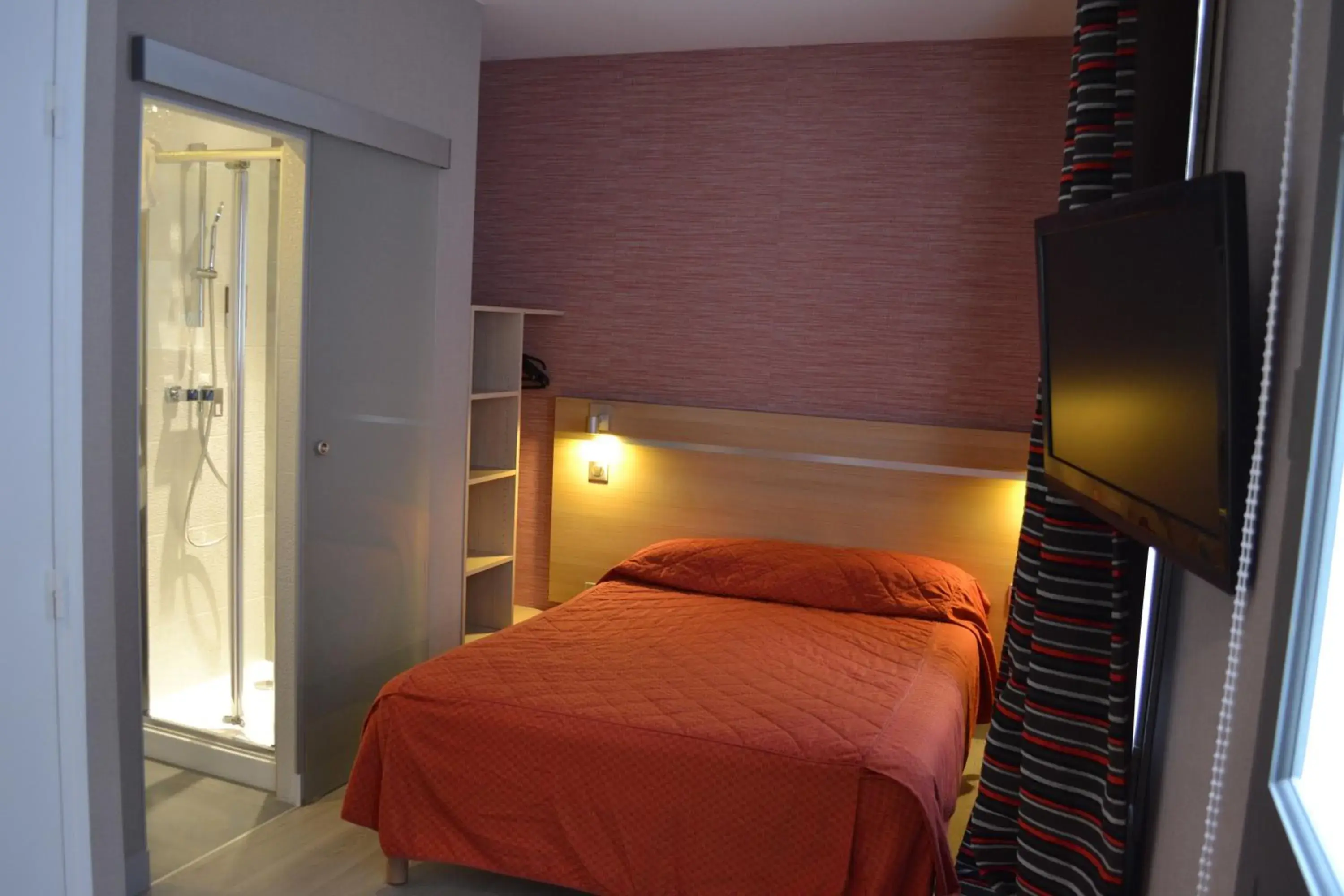 Bed in Hôtel des Pavillons Bed in Hôtel des Pavillons