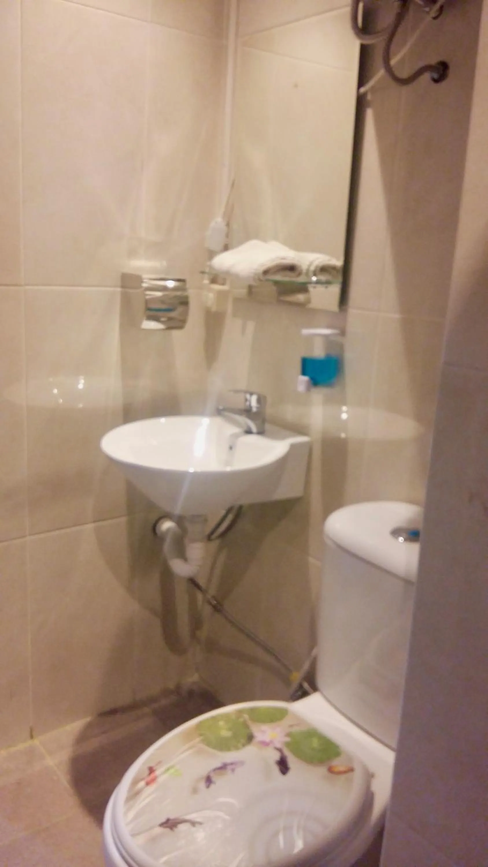 Bathroom in Apartment Grand Asia Afrika SKYEN