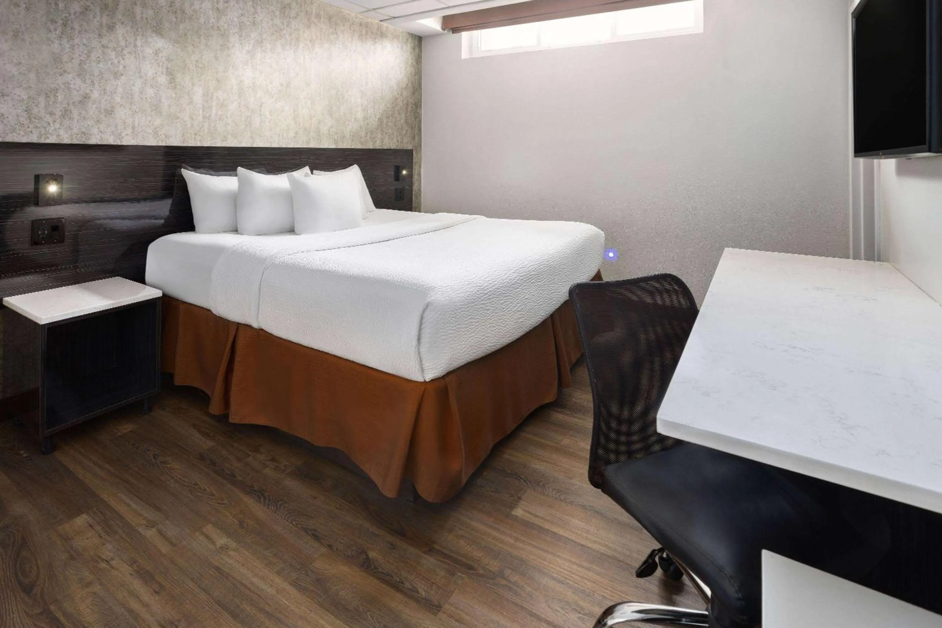 Bed in Ramada by Wyndham Bronx