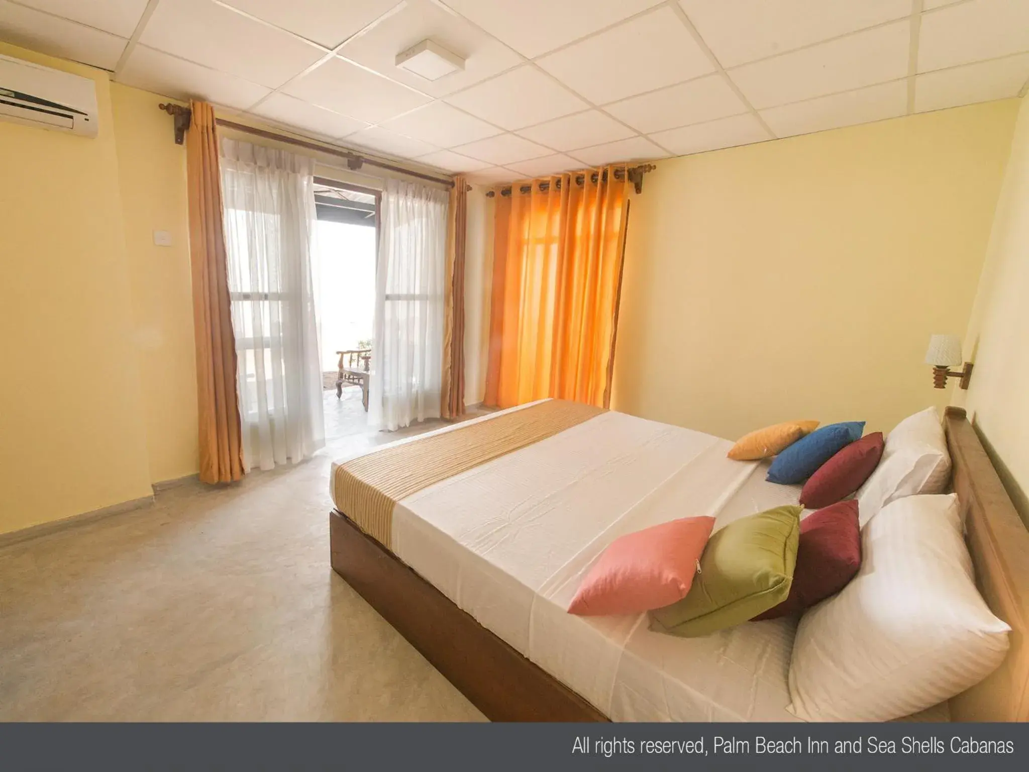 Bed in Palm Beach Inn & Sea Shells Cabanas Bed in Palm Beach Inn & Sea Shells Cabanas