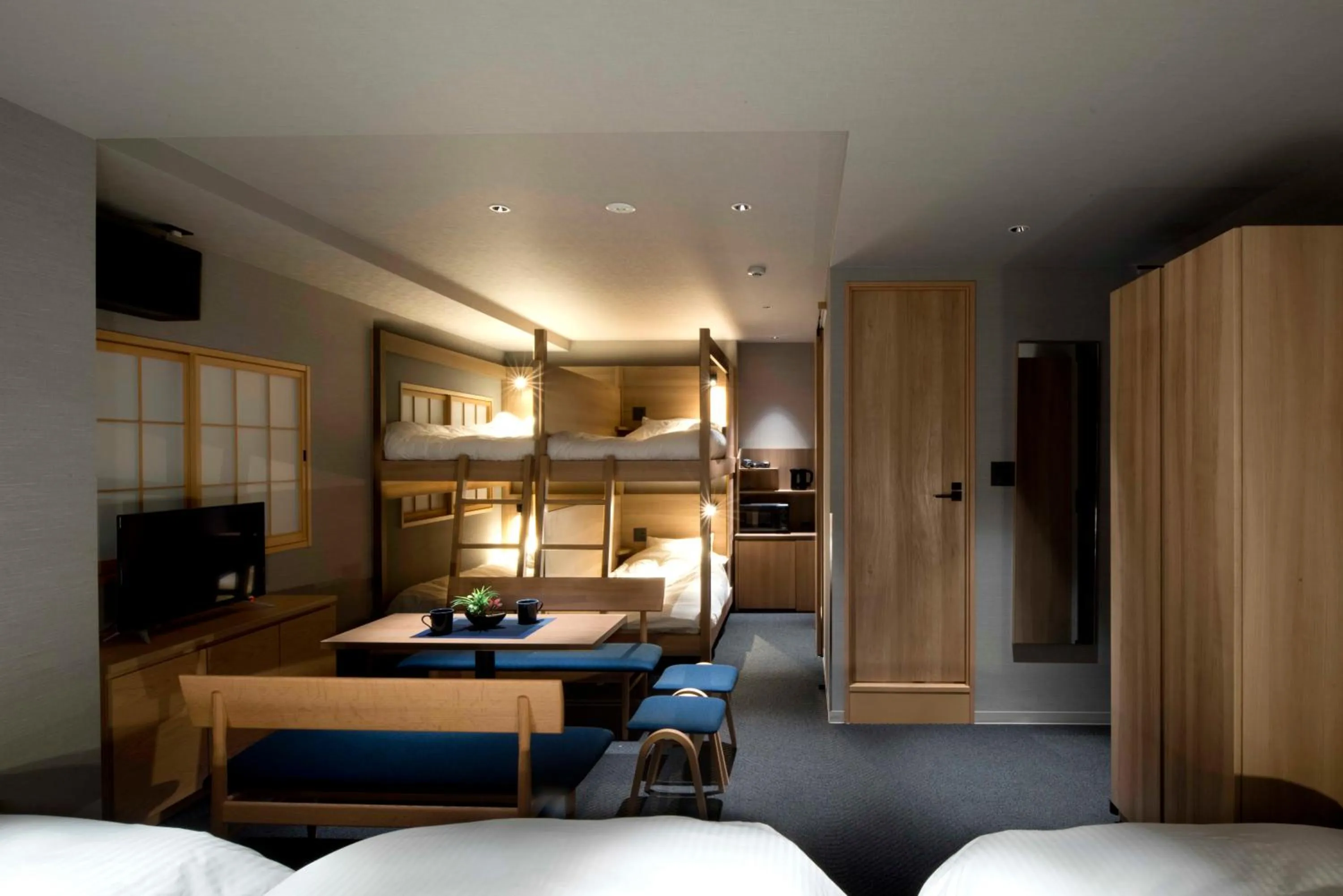 Bed in ALPHABED INN Takamatsuekimae