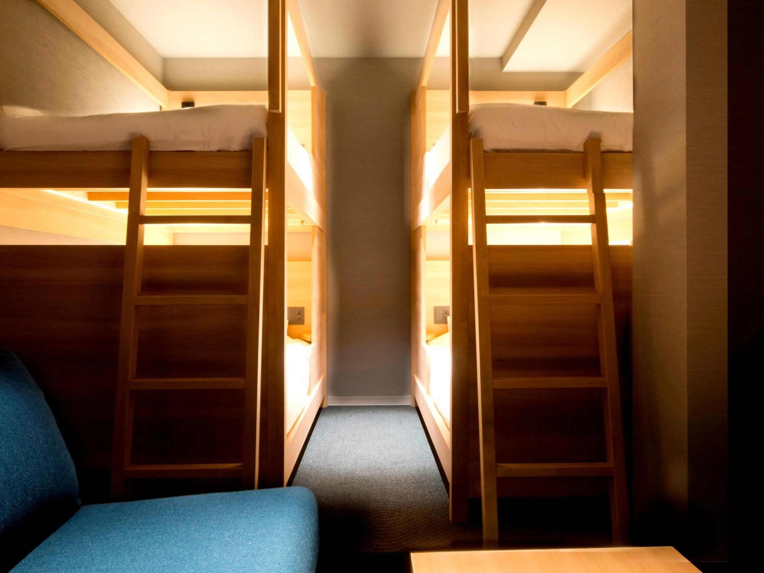 Bed in ALPHABED INN Takamatsuekimae