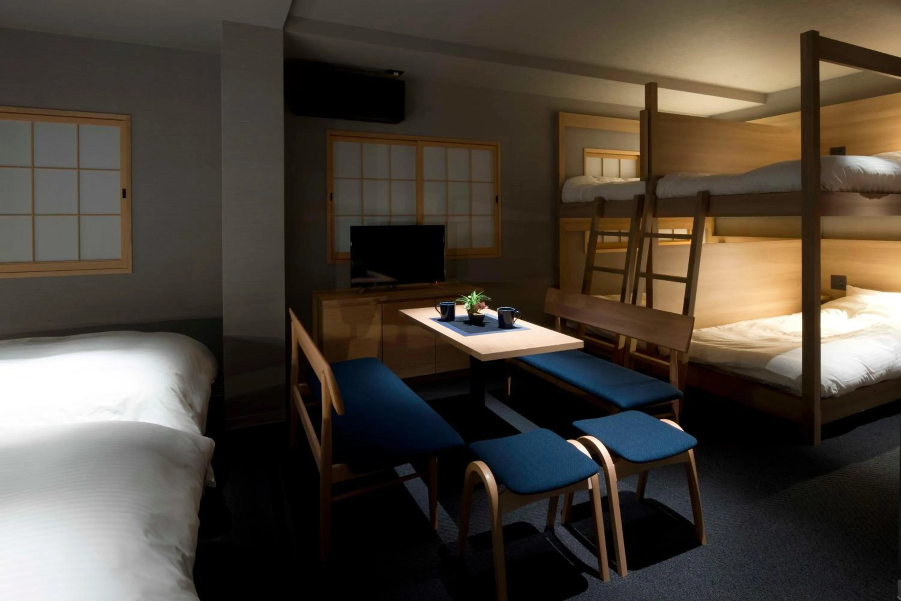 Bed in ALPHABED INN Takamatsuekimae