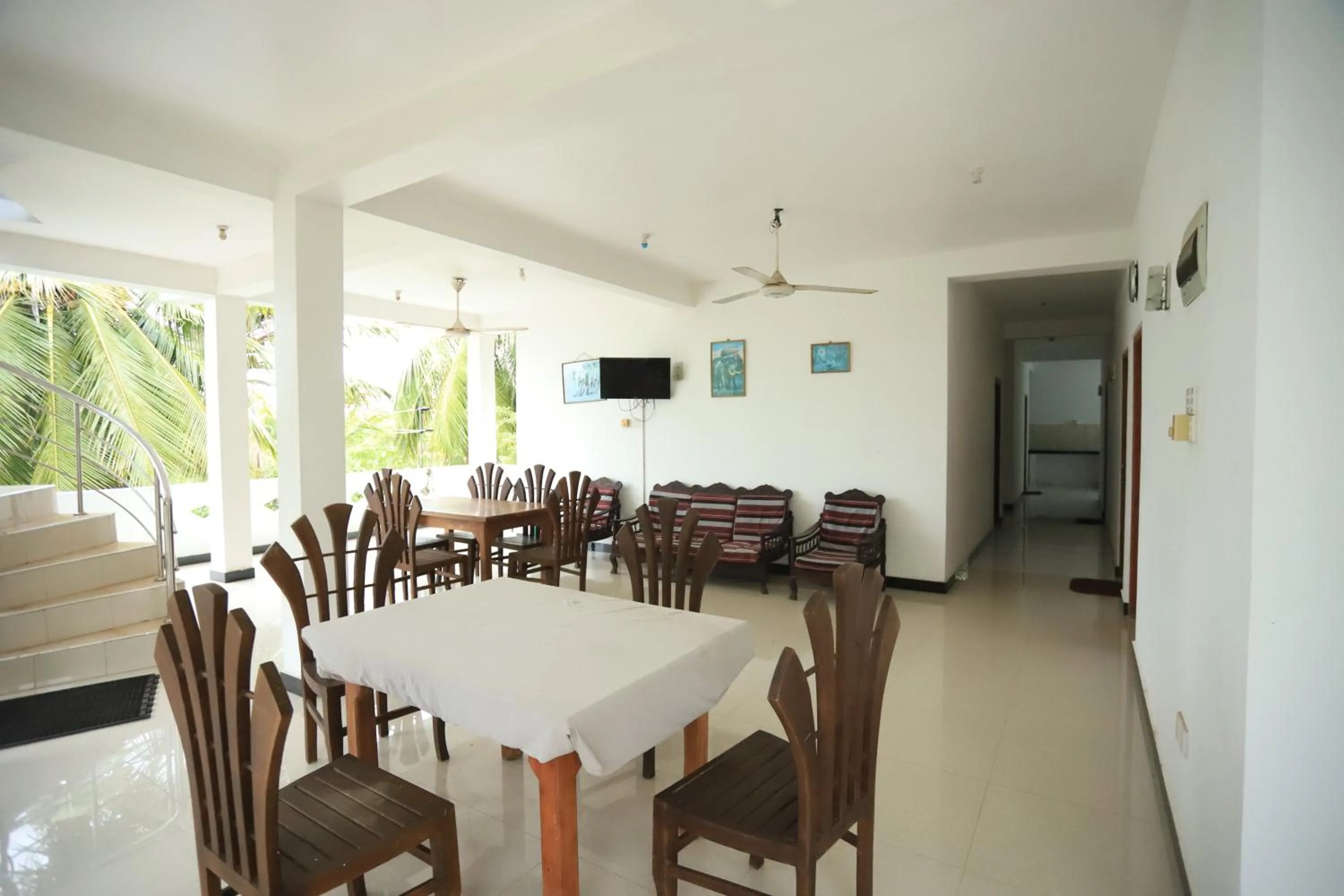 Communal lounge/ TV room in Pleasure Island Holiday Home