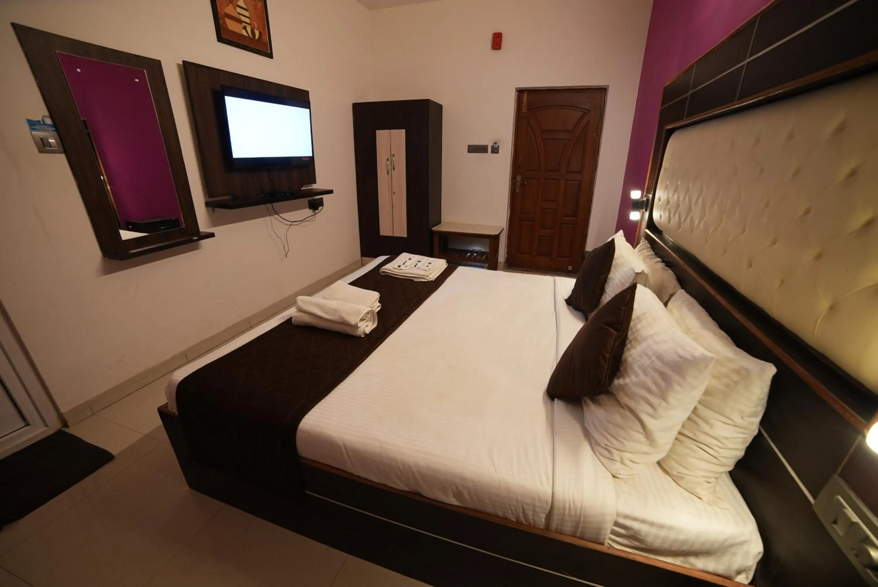 Bed in SS Silver Oaks Resort