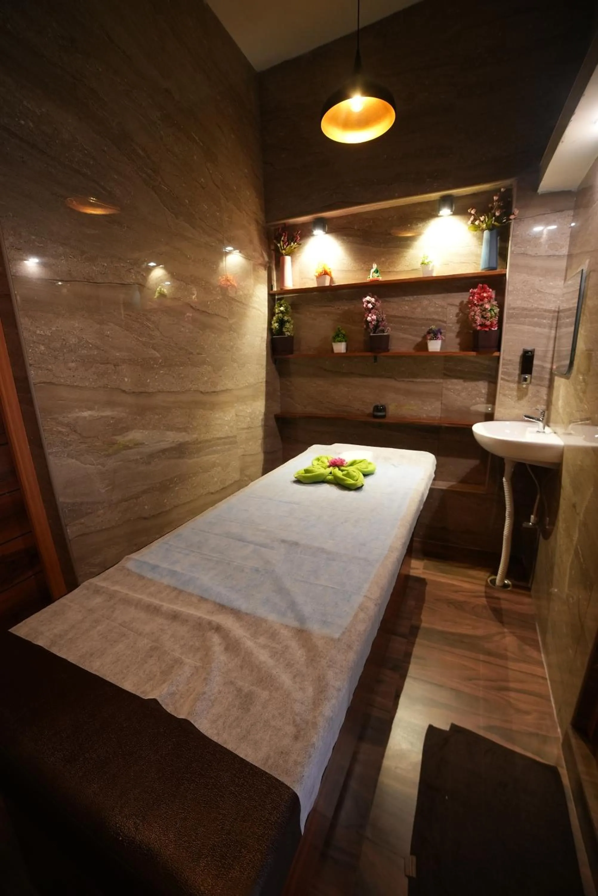 Bed in SS Silver Oaks Resort