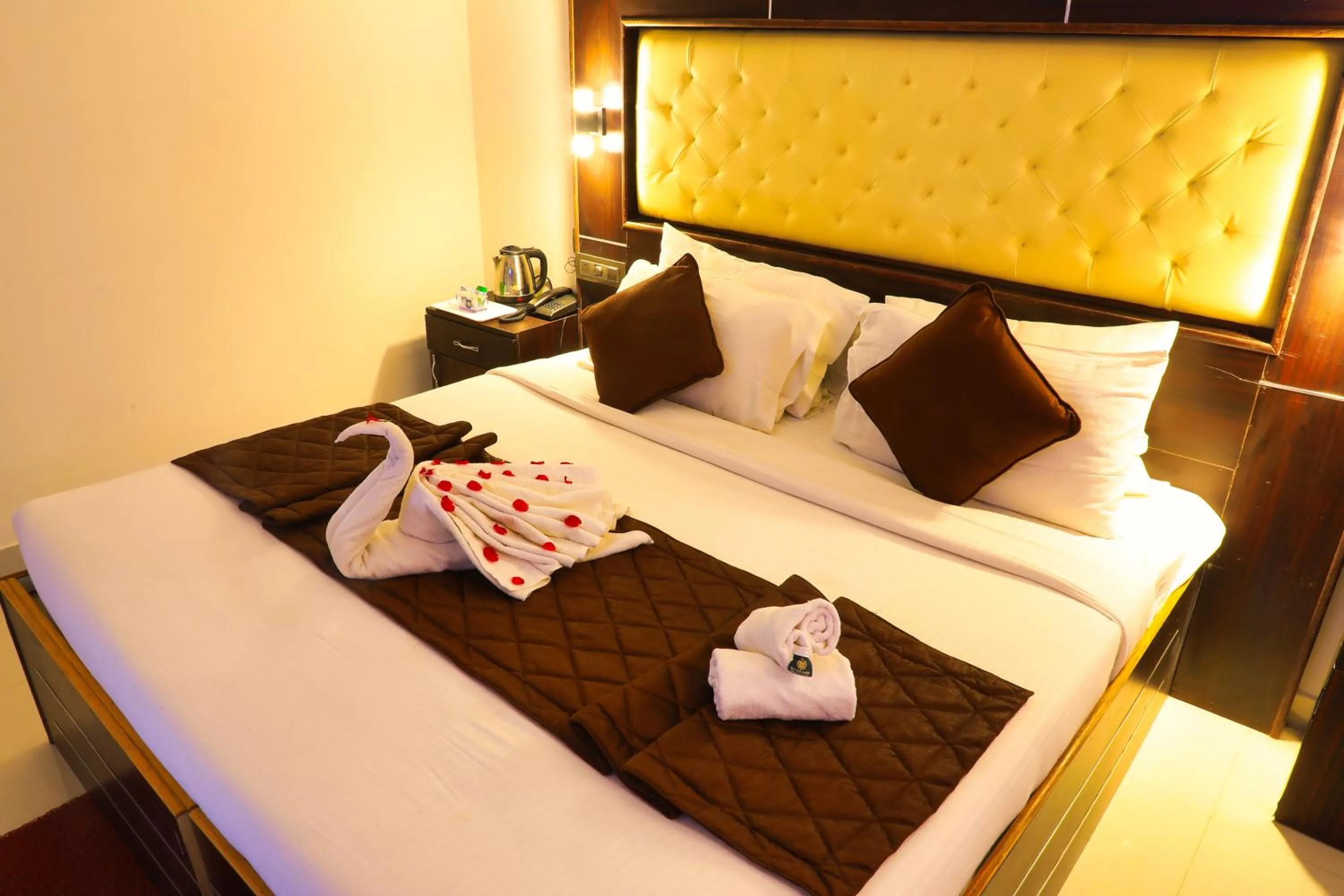 Bed in SS Silver Oaks Resort