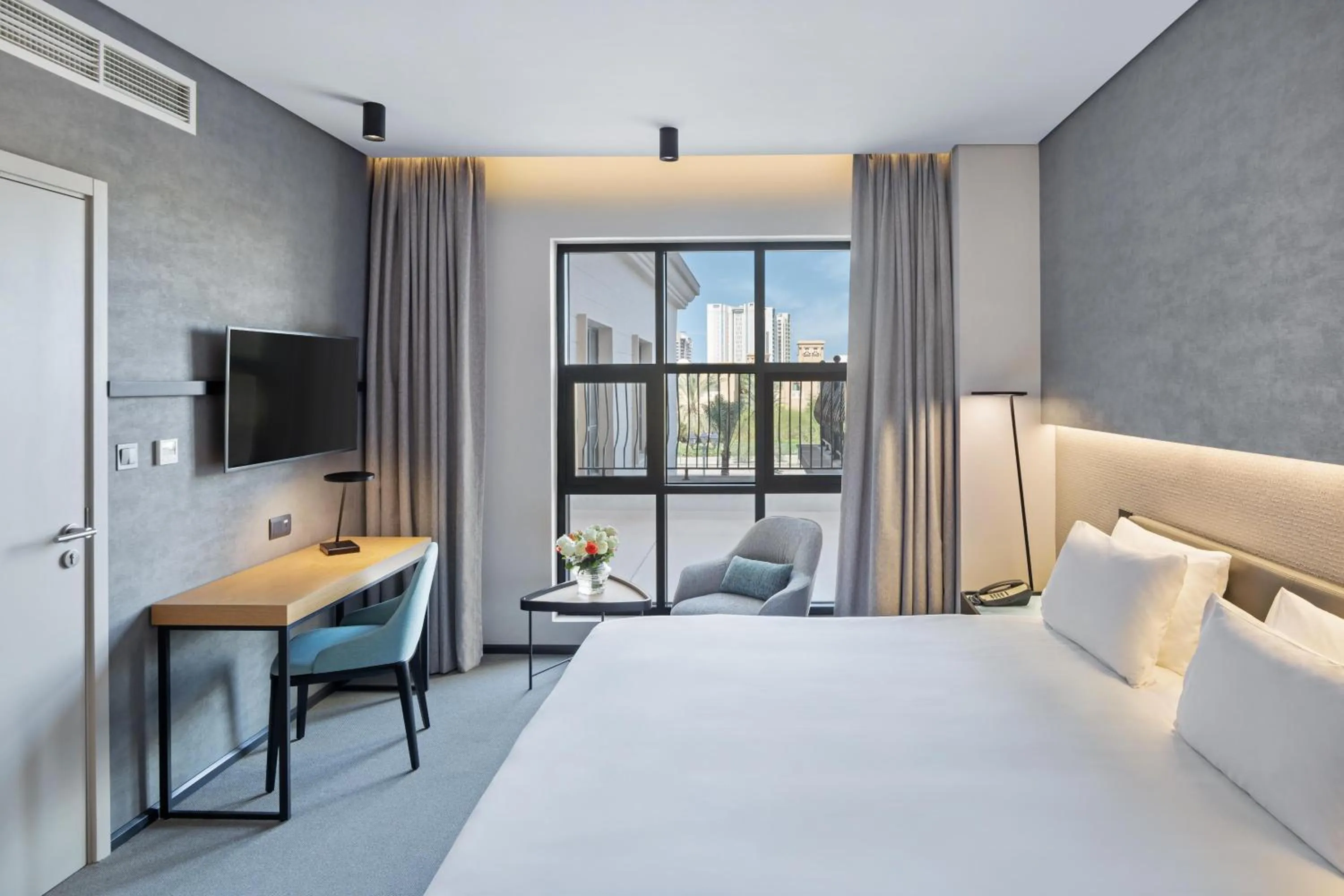 Photo of the whole room, Bed in JA The Manor Hotel, Dubai