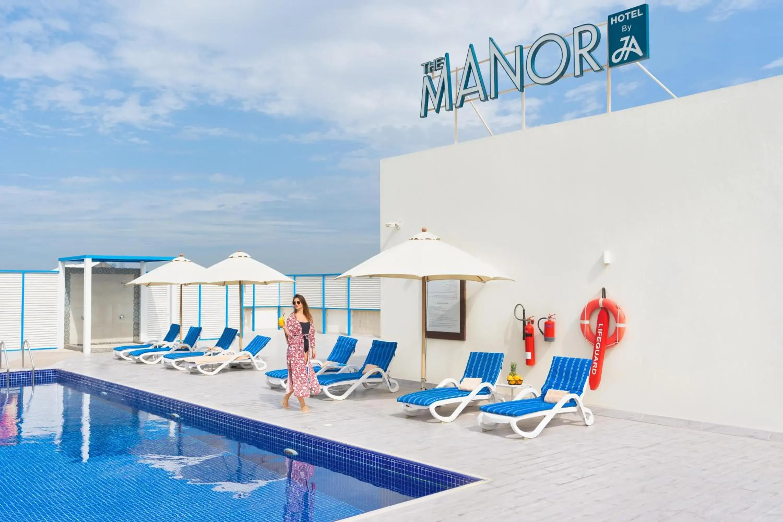 Swimming pool in JA The Manor Hotel, Dubai Swimming pool in JA The Manor Hotel, Dubai