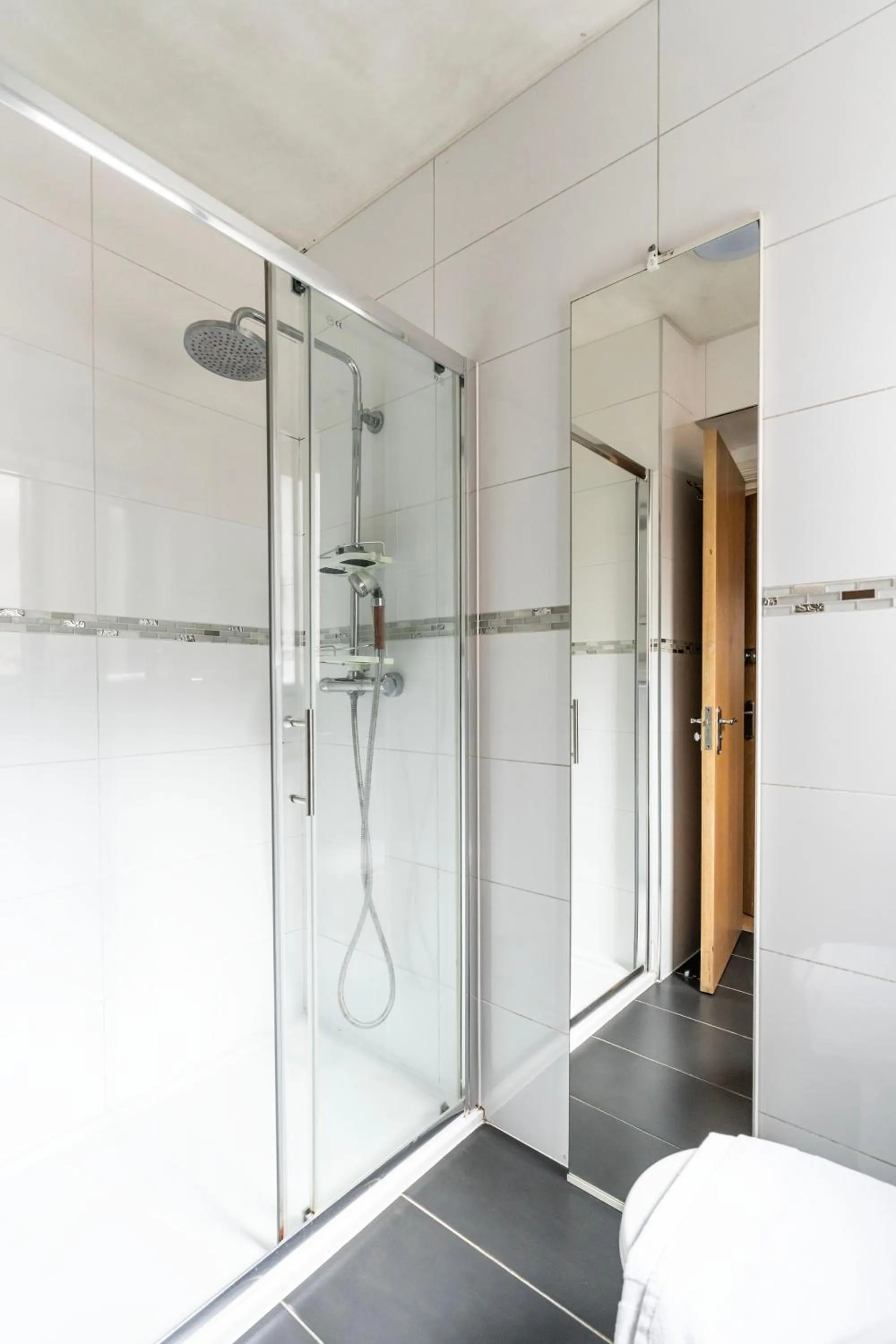 Shower in Shoreditch Apartments by DC London Rooms