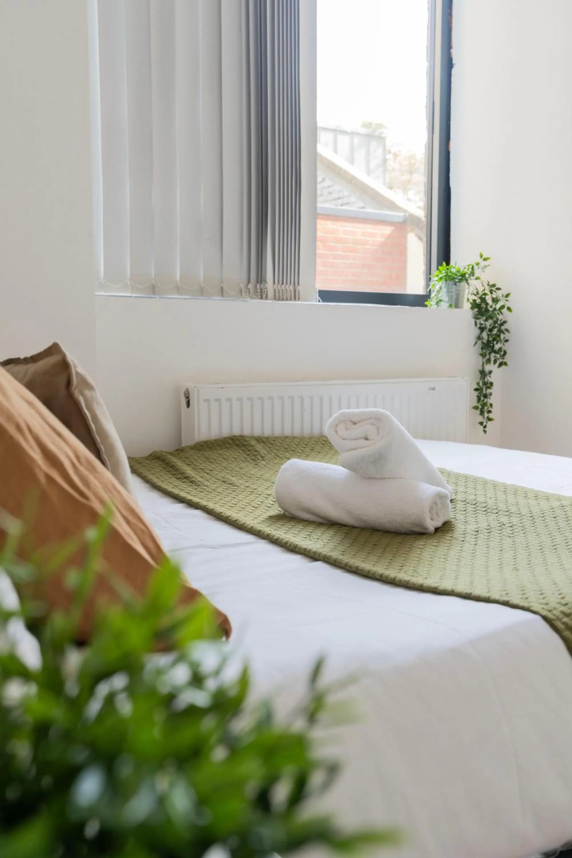 Bed in Shoreditch Apartments by DC London Rooms