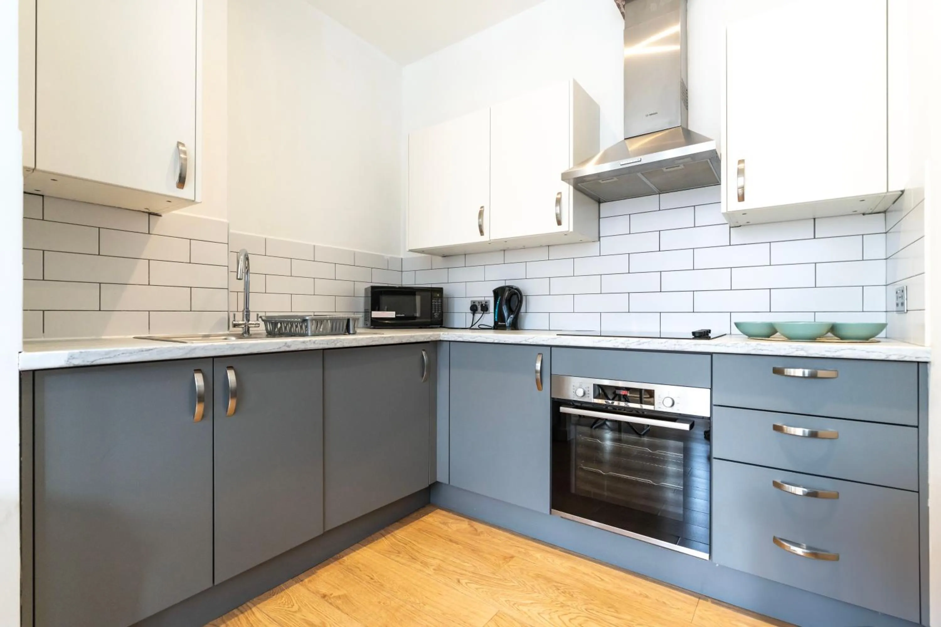 Kitchen or kitchenette in Shoreditch Apartments by DC London Rooms