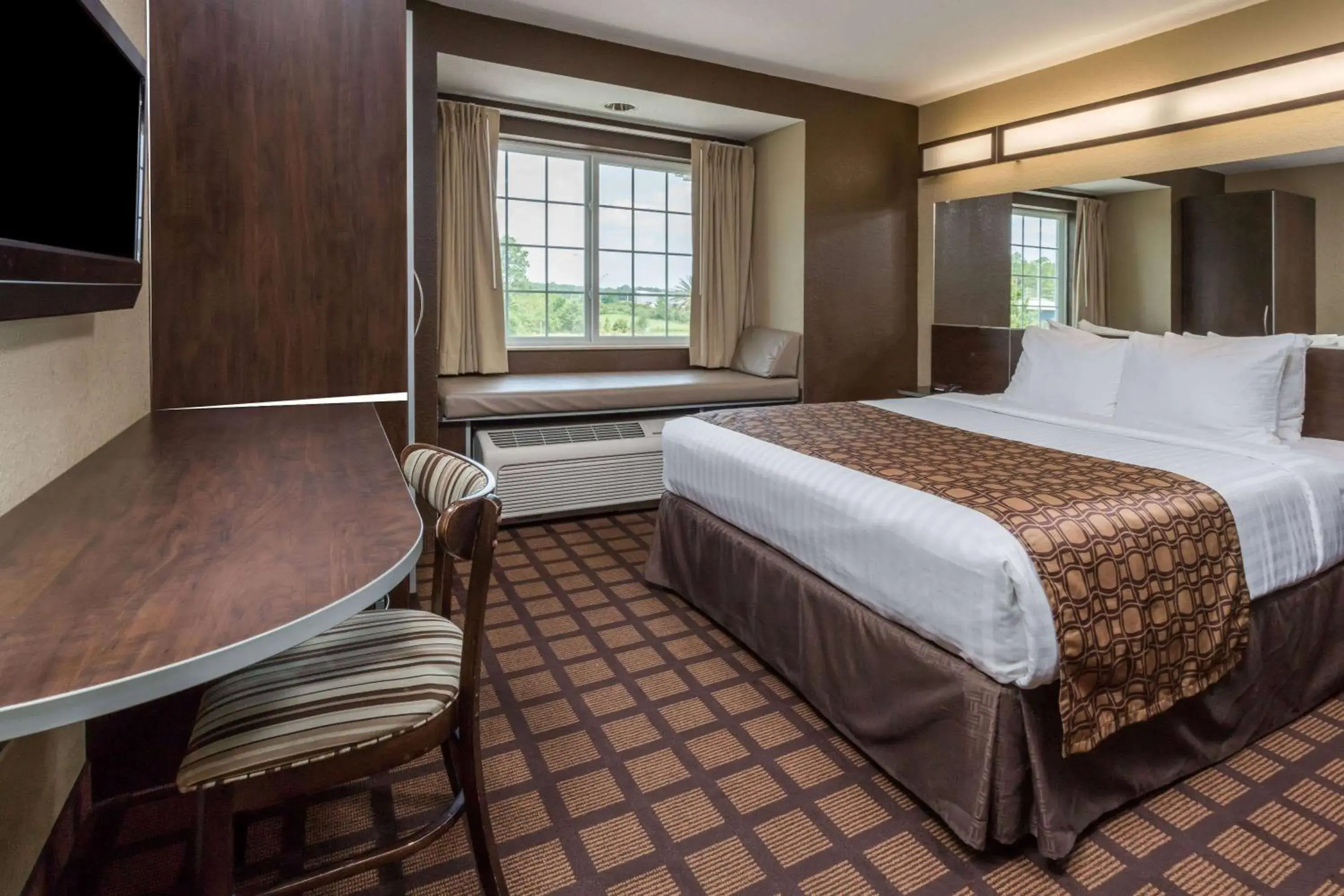 Photo of the whole room, Bed in Microtel Inn & Suites by Wyndham Jacksonville Airport Photo of the whole room, Bed in Microtel Inn & Suites by Wyndham Jacksonville Airport